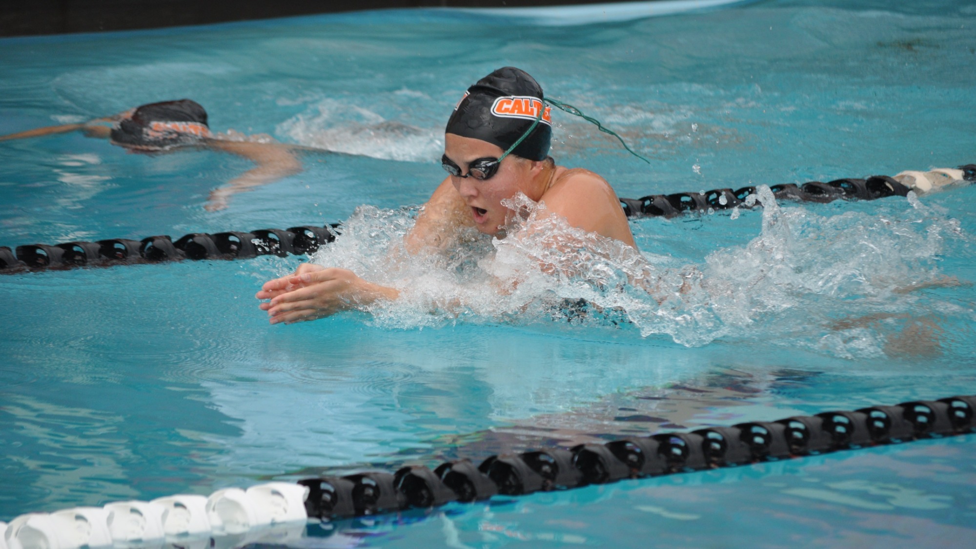 Grace Davis extends her hands in front of her as part of her breaststroke 
