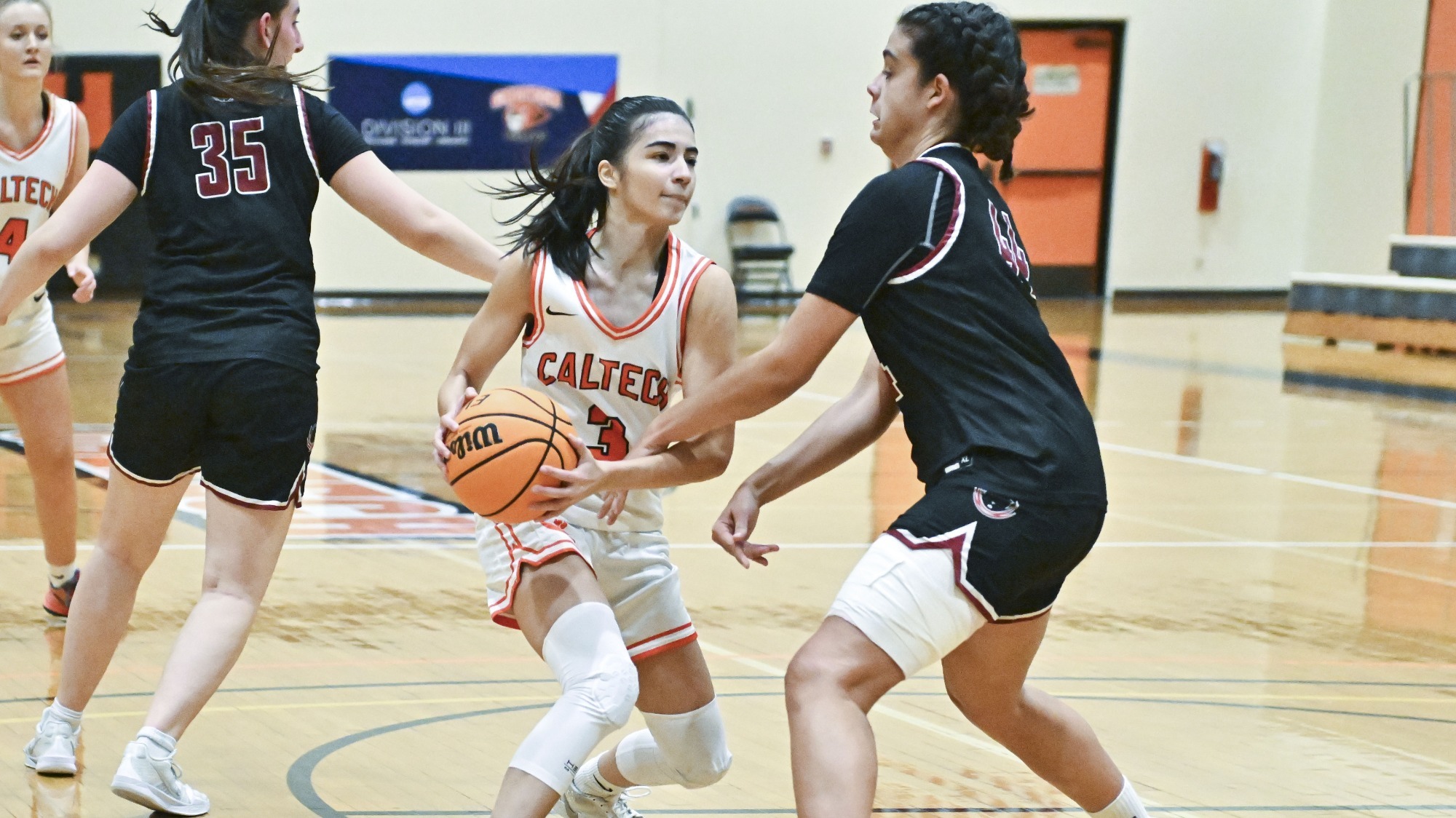 Zeynep Goktepe is fouled by a defender as she picks up her dribble in the lane against MIT