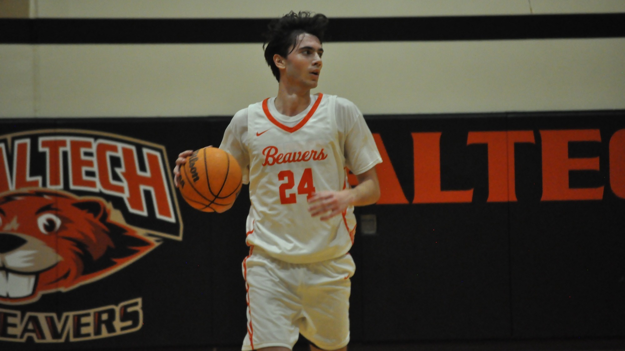 Glogovac vs. dribbles the ball up court undefended while scanning his options 