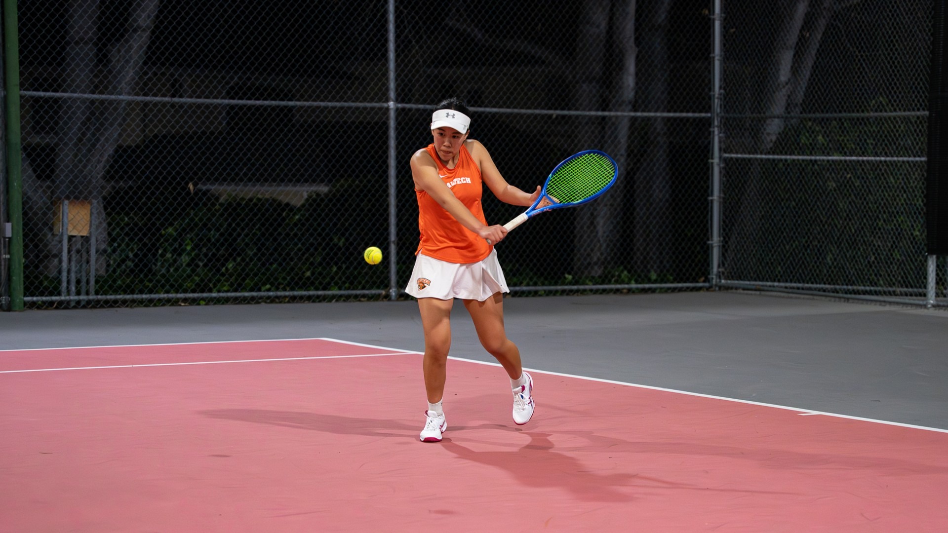 Tara Zhan returns a ball with her backhand