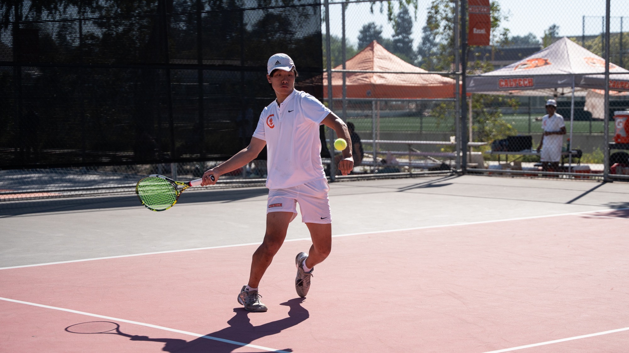 Erik He prepares for a right-handed forehand as the ball approaches him. 