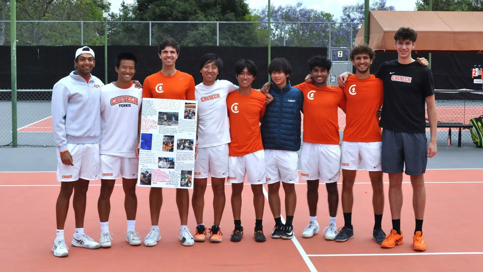 Andrew Zabelo and his Caltech Men's Tennis teammates