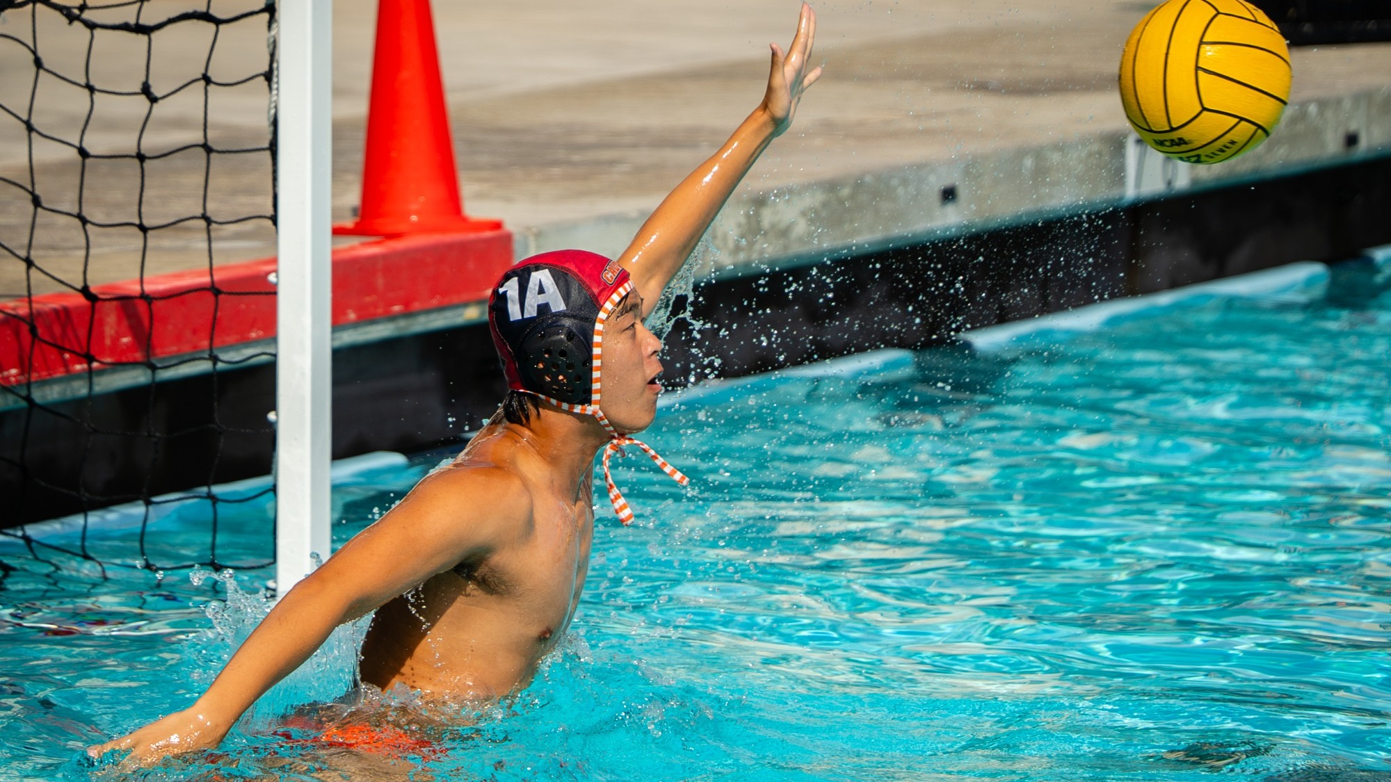 Tim Zhang rises up to save a shot on goal