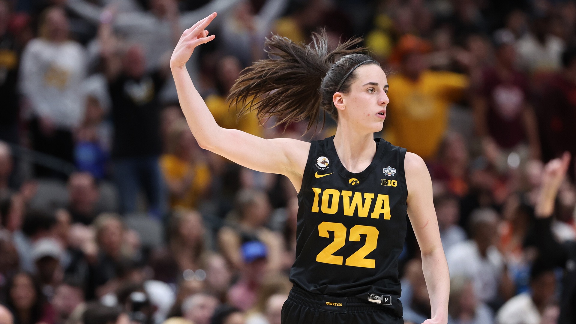 DALLAS, TX - MARCH 31: Caitlin Clark #22 of the Iowa Hawkeyes celebrate making a three-point shot against the South Carolina Gamecocks during the semifinals of the NCAA Women’s Basketball Tournament Final Four at American Airlines Center on March 31, 2023 in Dallas, Texas. (Photo by Justin Tafoya/NCAA Photos via Getty Images)