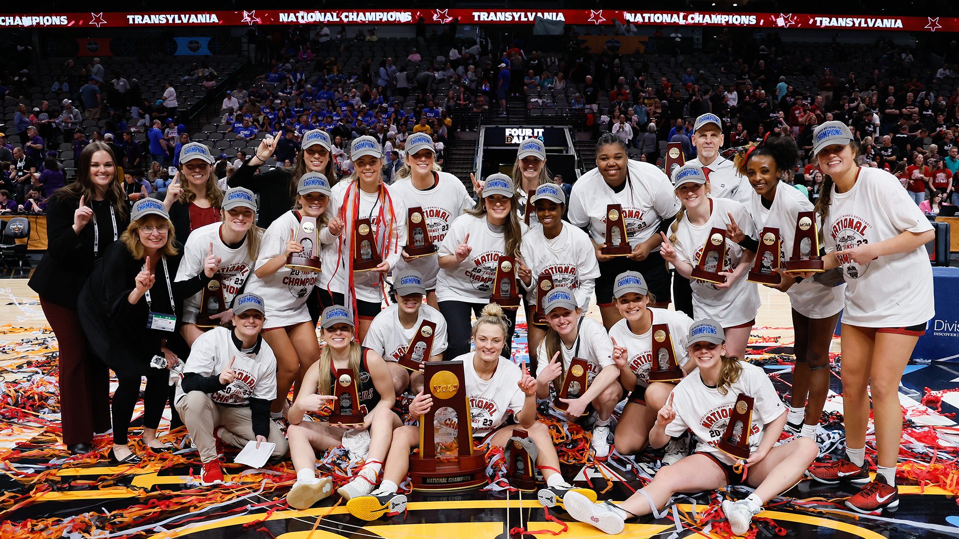 The Transylvania Pioneers celebrate after winning the 2023 Division III Women’s Basketball Championship 