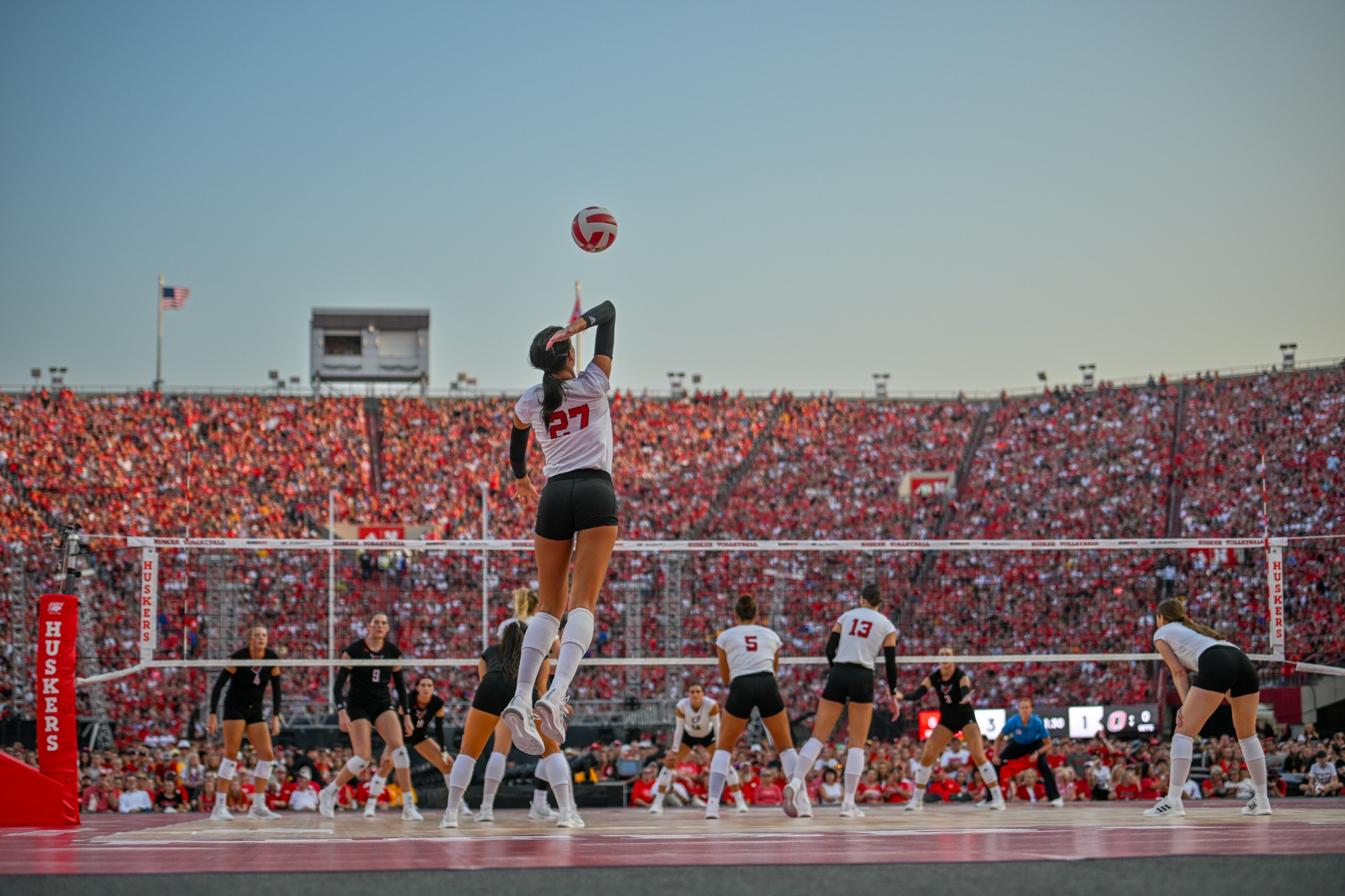 LINCOLN, NEBRASKA - AUGUST 30: Harper Murray #27 of the Nebraska Cornhuskers serves against the Omaha Mavericks at Memorial Stadium on August 30, 2023 in Lincoln, Nebraska. (Photo by Steven Branscombe/Getty Images)