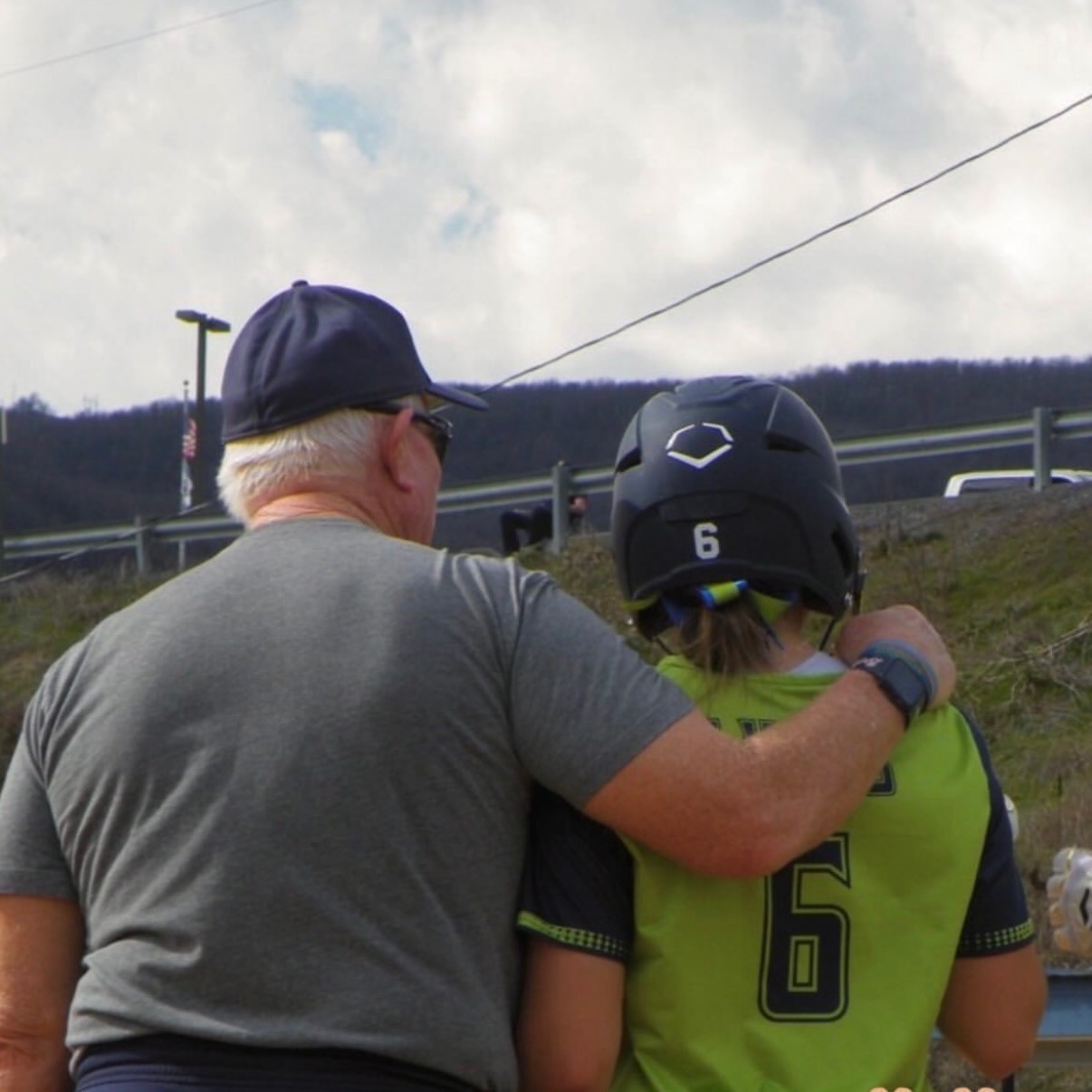 Coach Twigg coaching Bri Lucas at 3rd