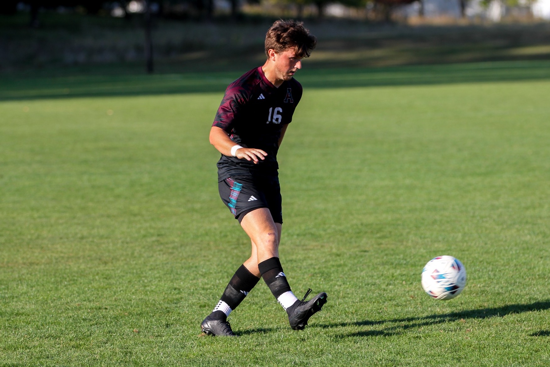 JJ Riggsby moves the ball