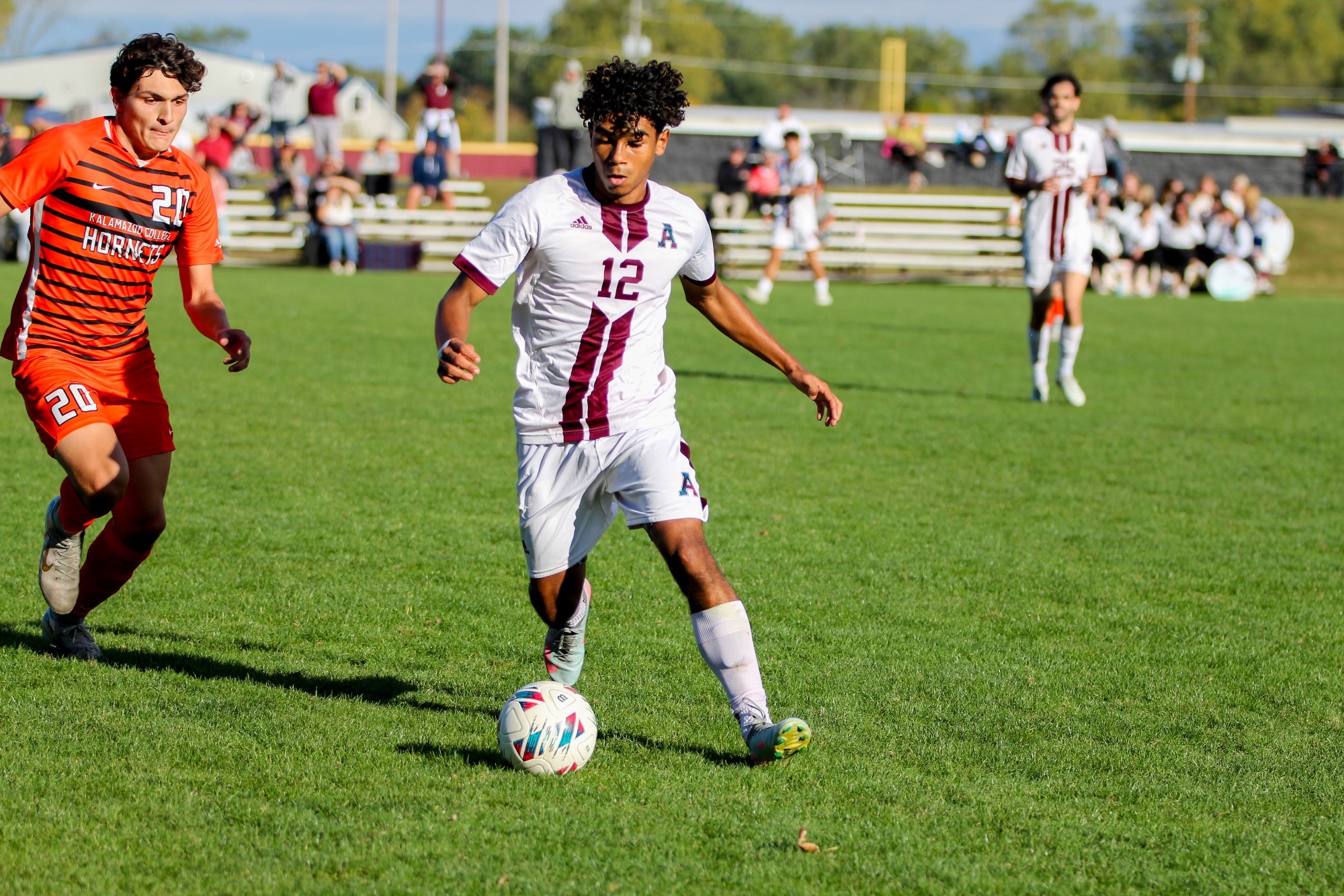 C Cepeda dribbles a ball