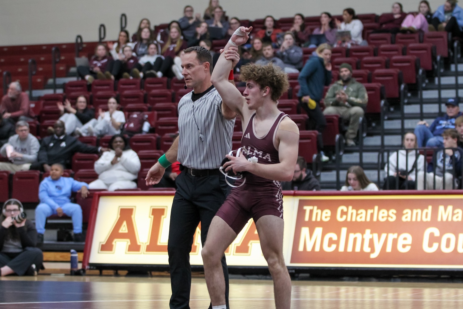 D Gumtow has his hand raised in victory