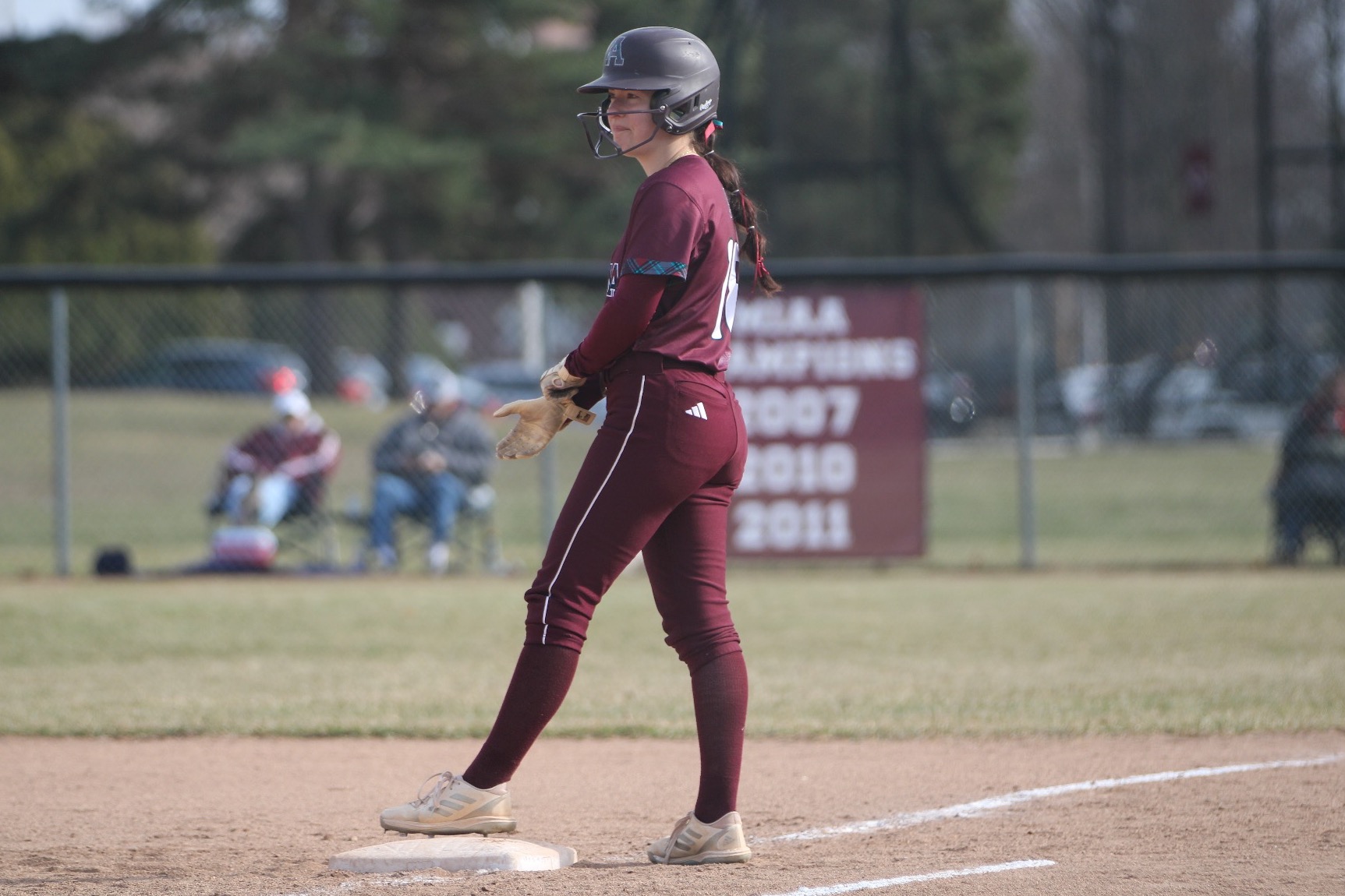 S Wolverton stands on first base