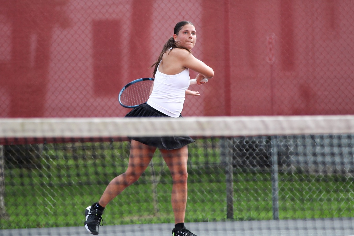 K Kushner returns a shot