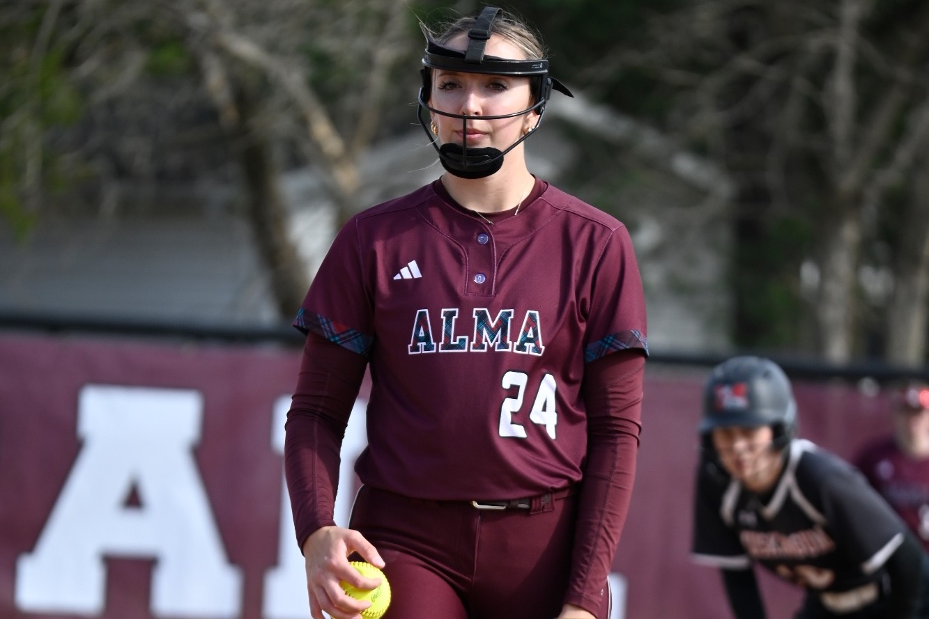 M Kenney prepares to deliver a pitch
