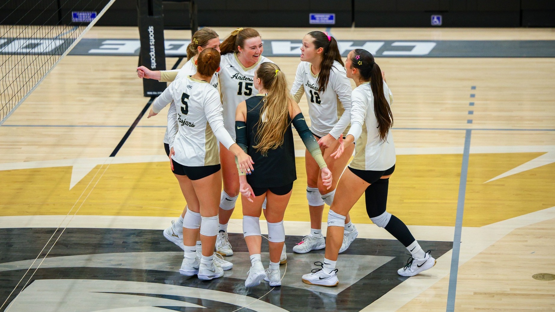 The team celebrates after a point versus Lenoir-Rhyne 