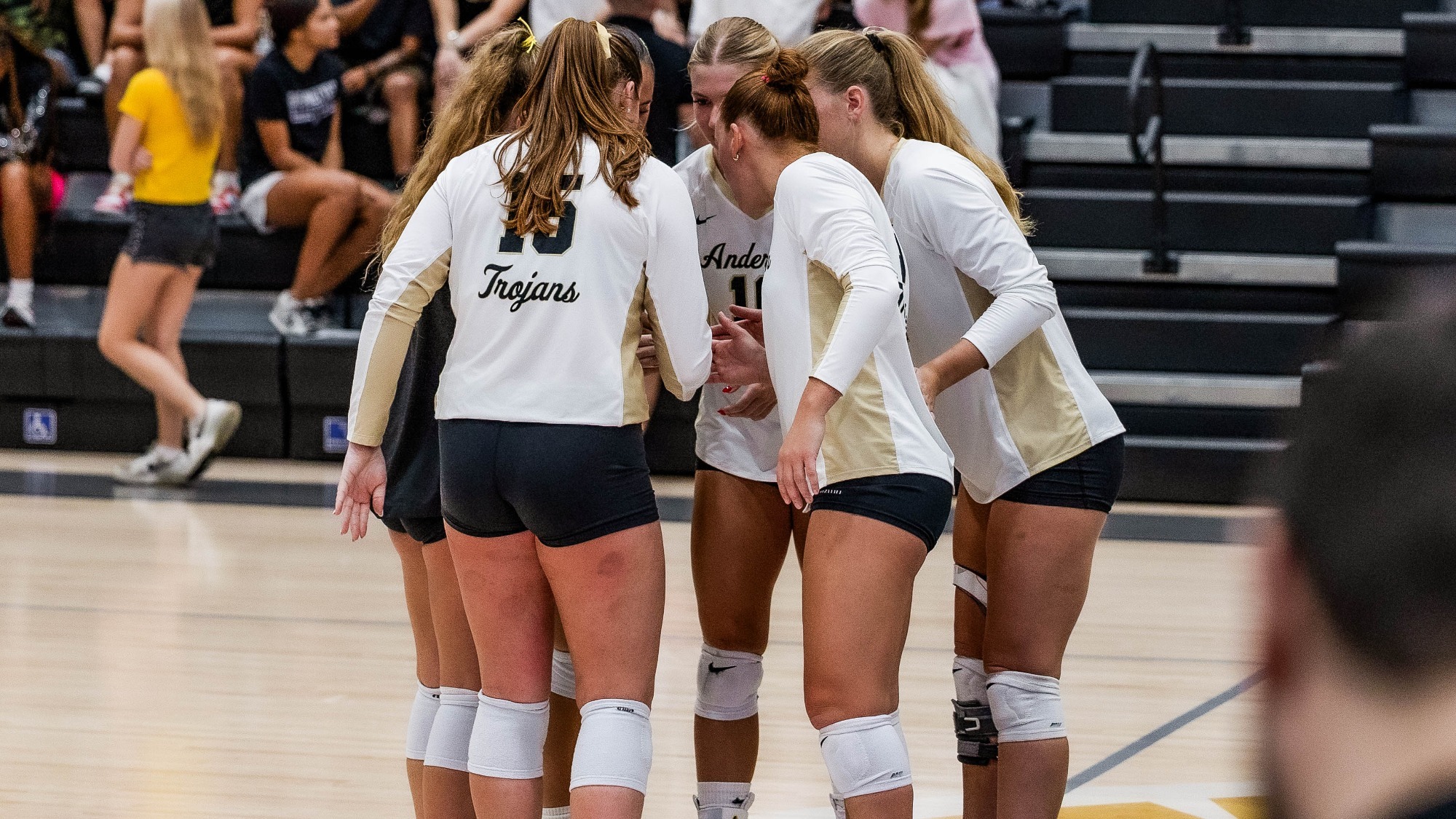 The team huddles after a point 