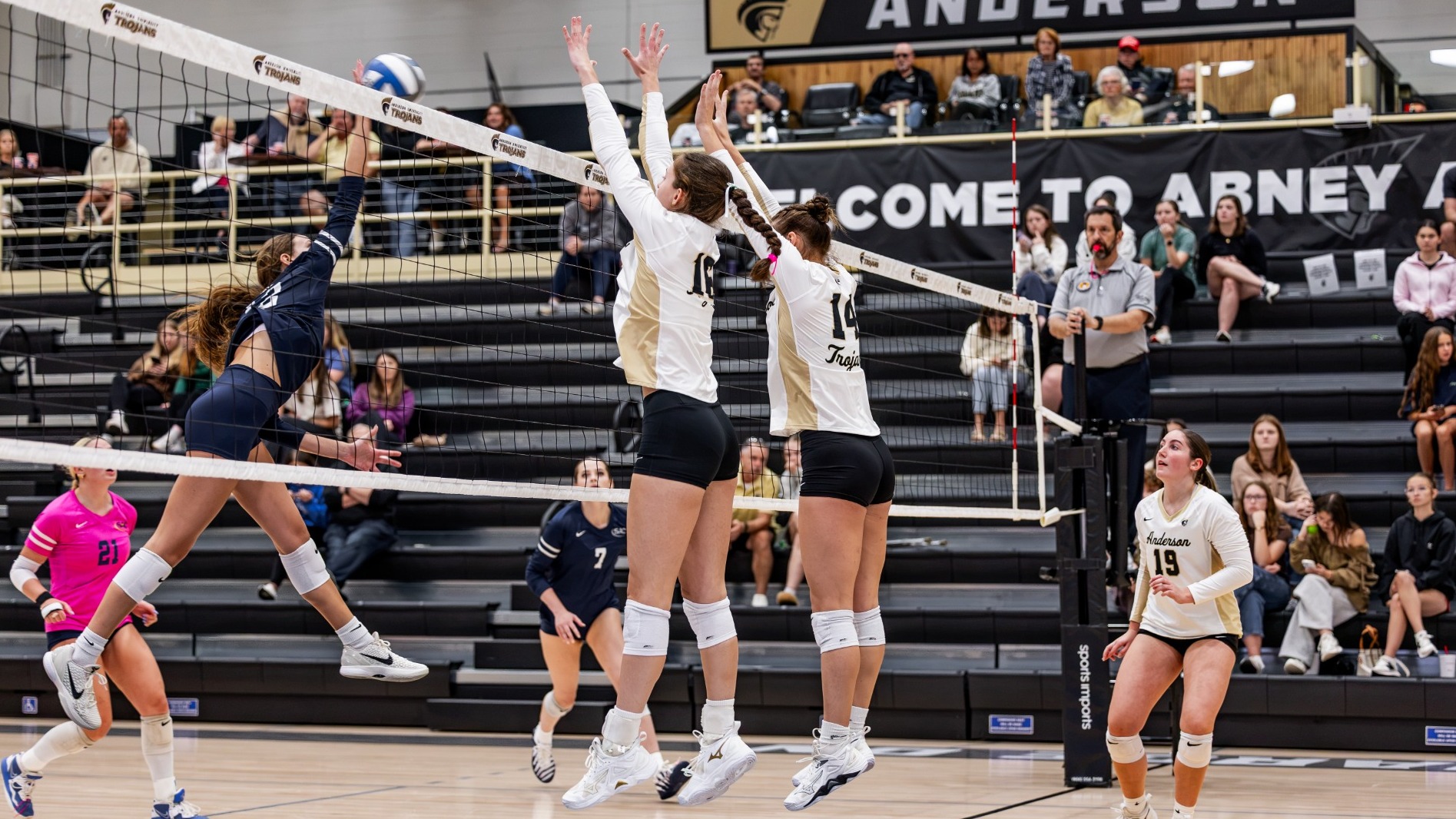 Jacey Olsen and Kaydan Flowers go for a block versus Emory & Henry 