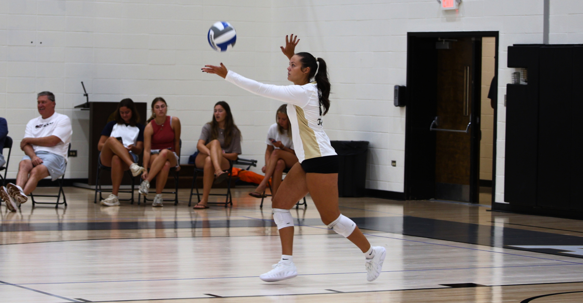 Kaleigh Garren gets ready to serve the ball 