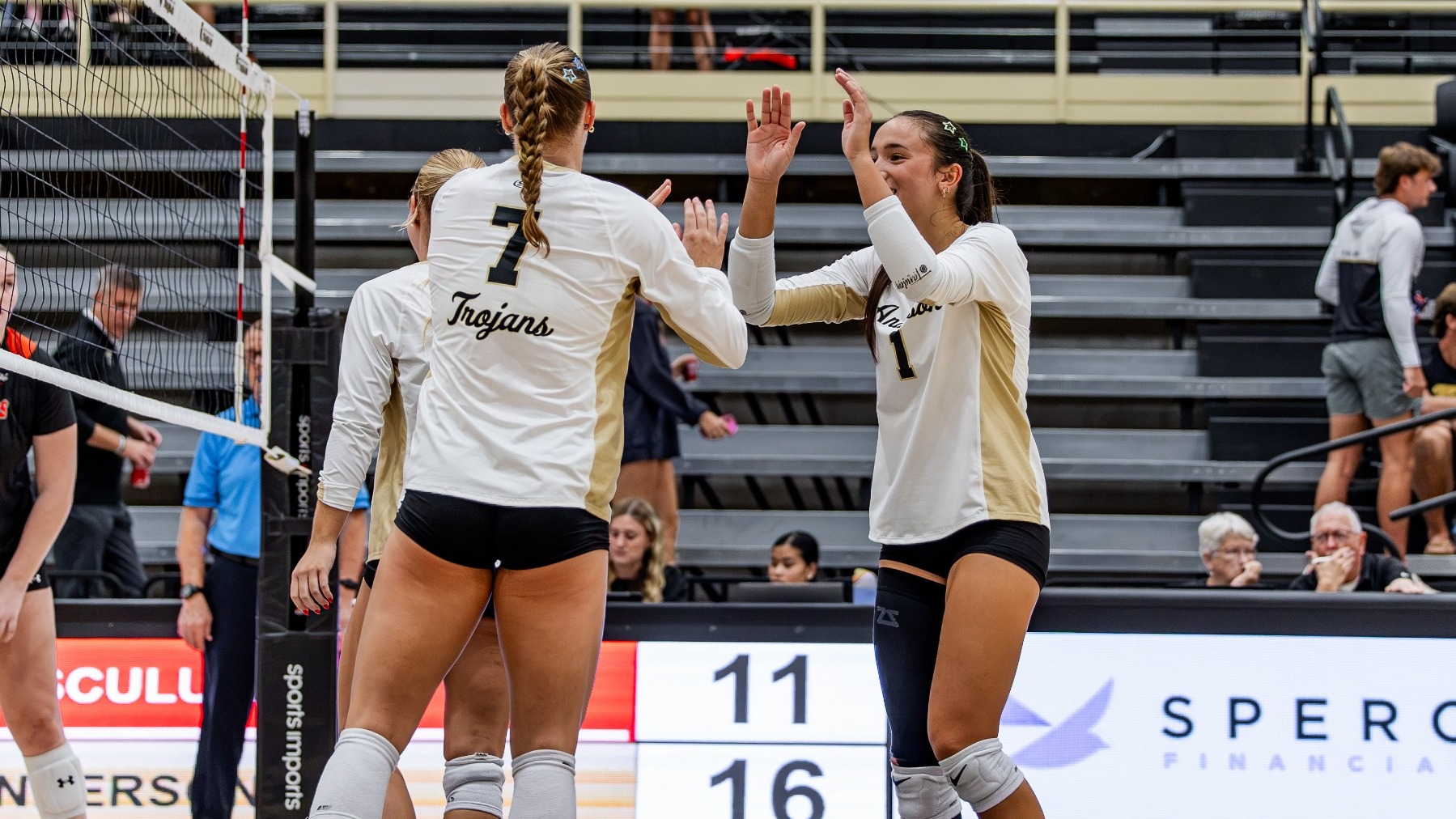 Emily Campbell and Mikaylah Hedlund high five versus Tusculum 