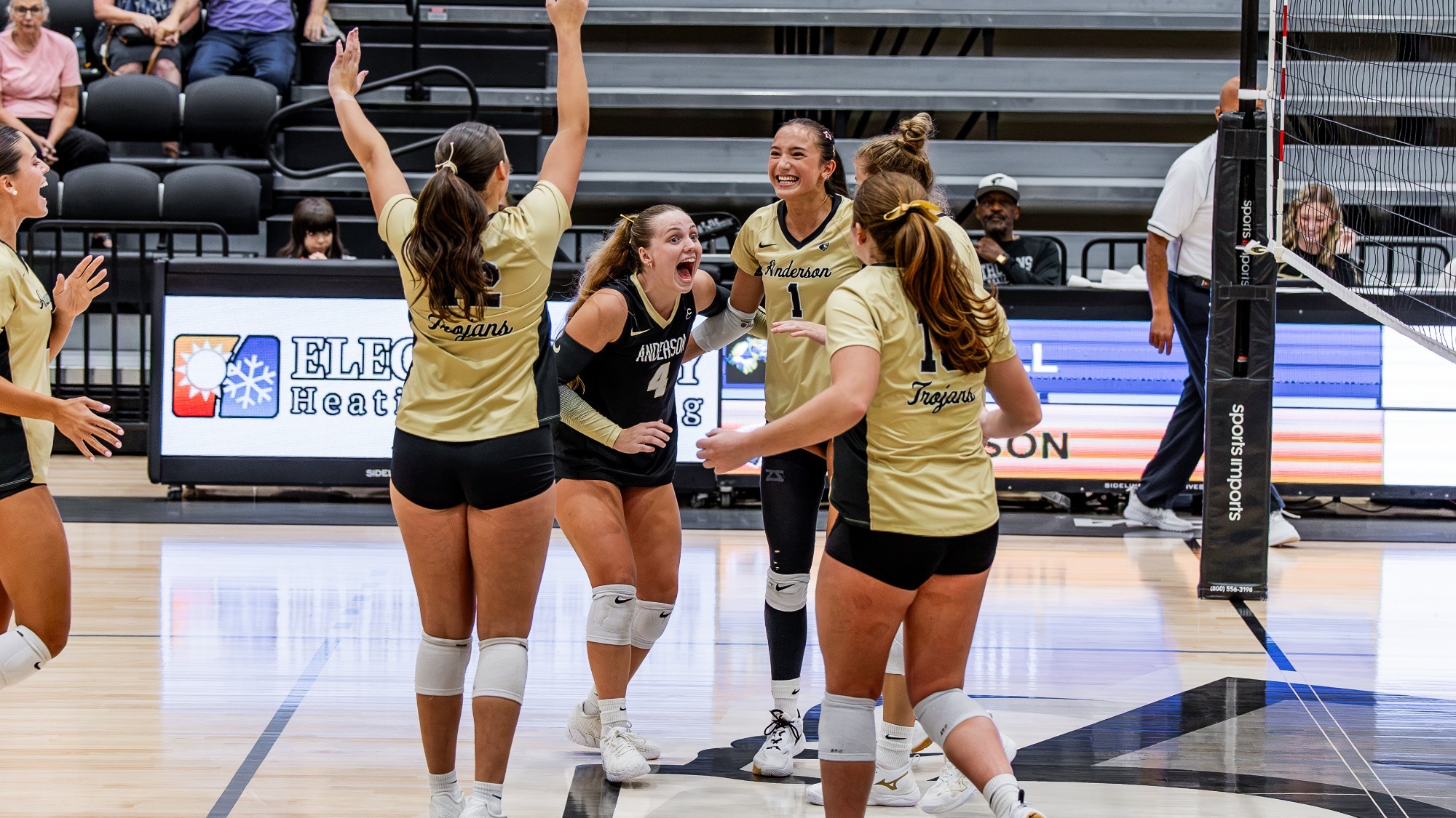 The team celebrates after a point versus Mars Hill 