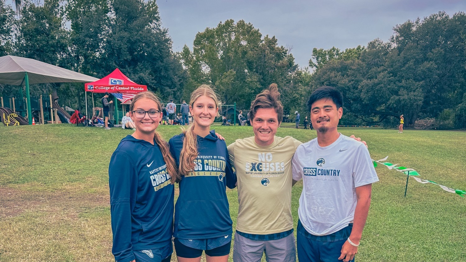 The four members of the BUF Cross Country team pose for a Group Photo