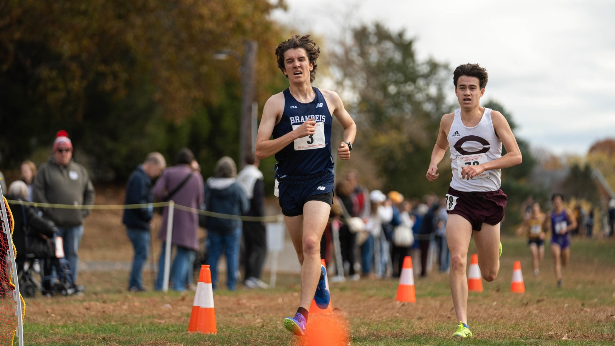Lucas Dia approaches the finish line at the UAA Cross Country Championships