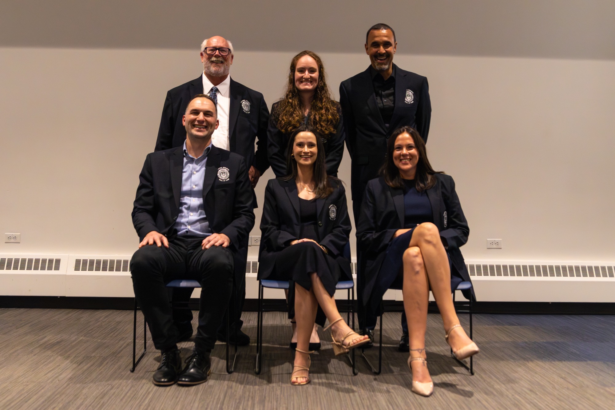 The Brandeis Hall of Fame Class of 2025: Front, from left: Steve DeLuca, Michaela Friedman Savonen, Jaime Capra Mitchell; Back: Jim Brainerd, Julia Bryson, Ian Murray
