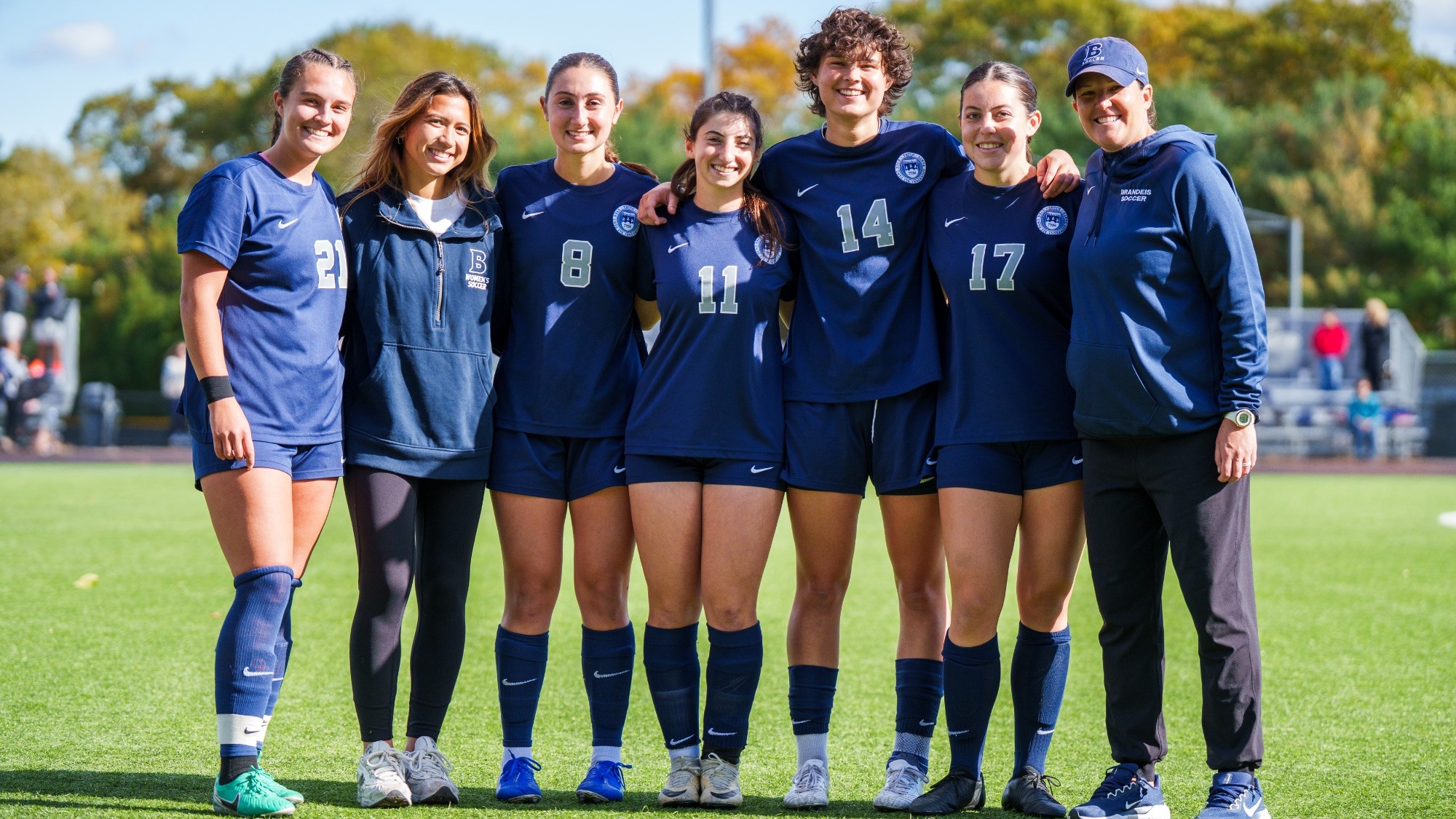 Brandeis Seniors and coaches before their senior day game