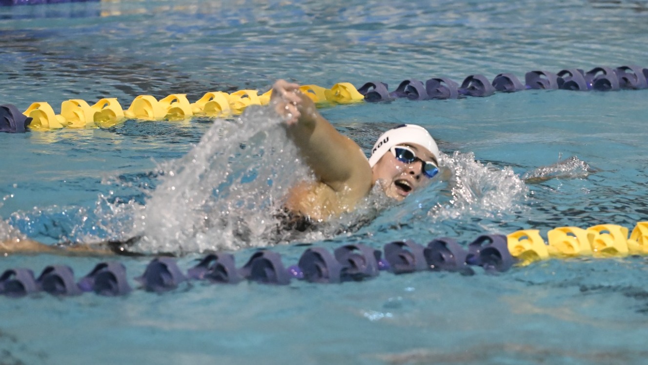 Anastasia Bekou '25 swimming during the 800-free relay