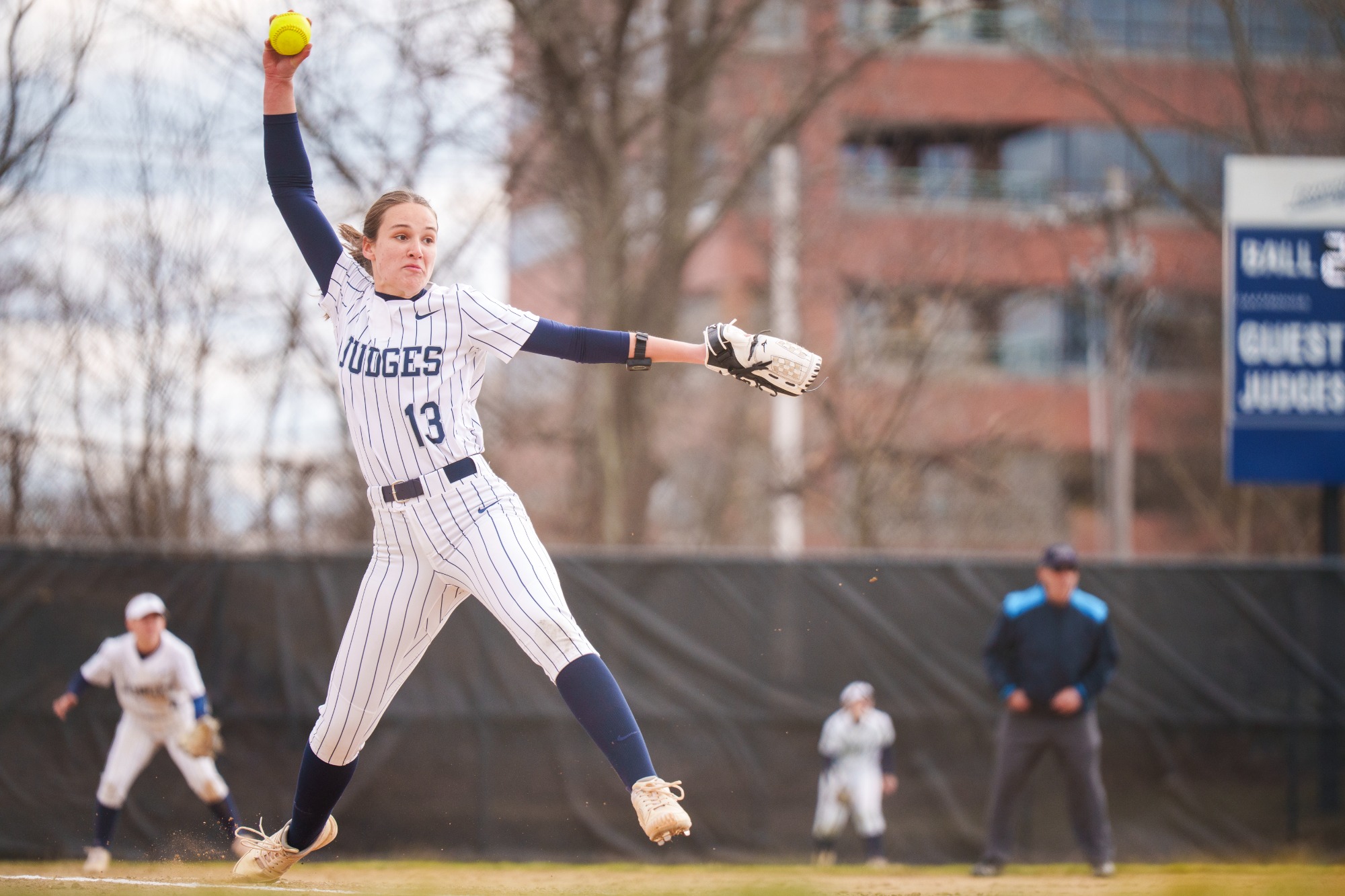 Claire Warden '28 in her windup during a softball game
