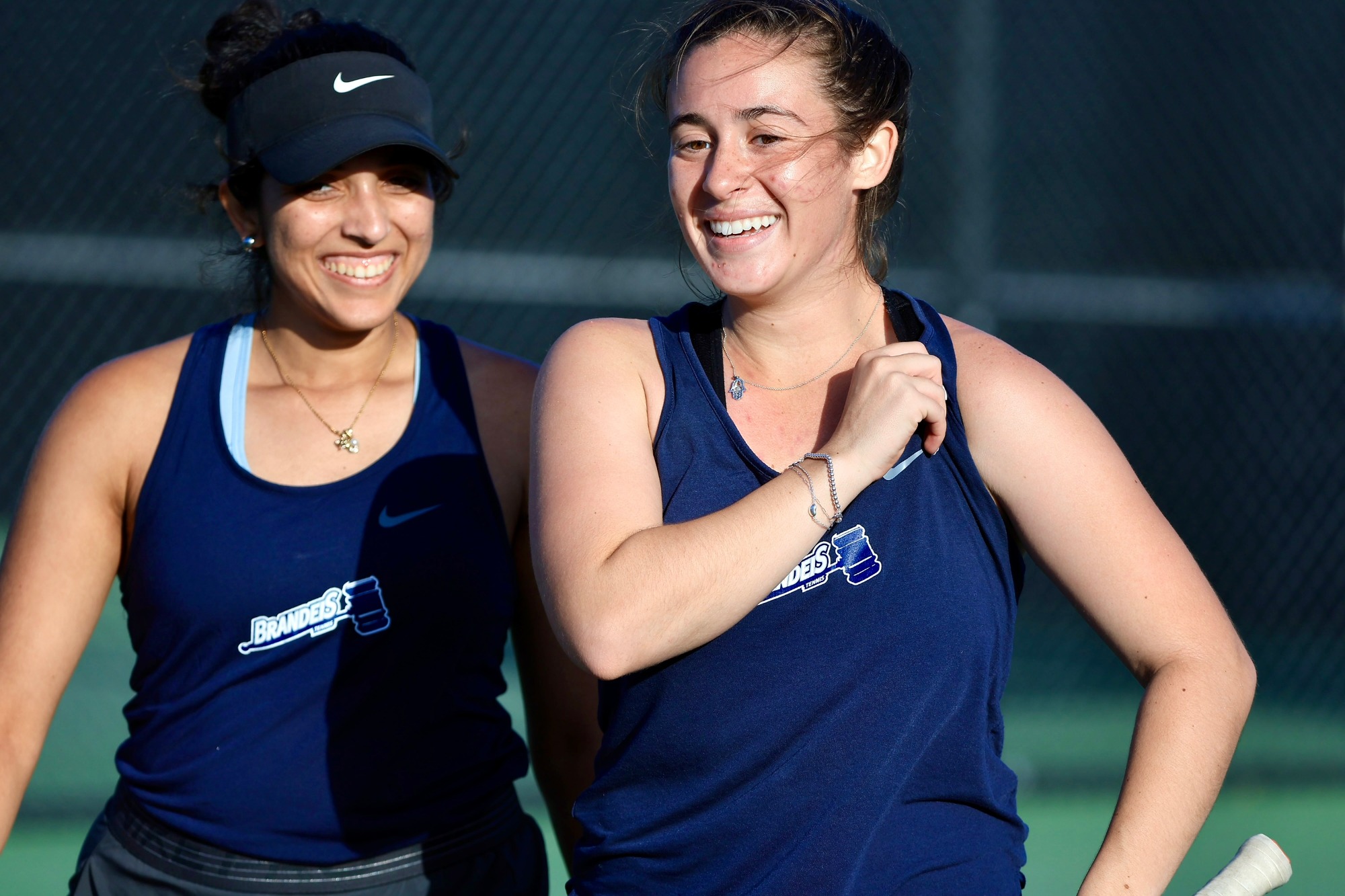 Bhakti Parwani and Rebecca Suarez share a smile between points at the NCAA Championships
