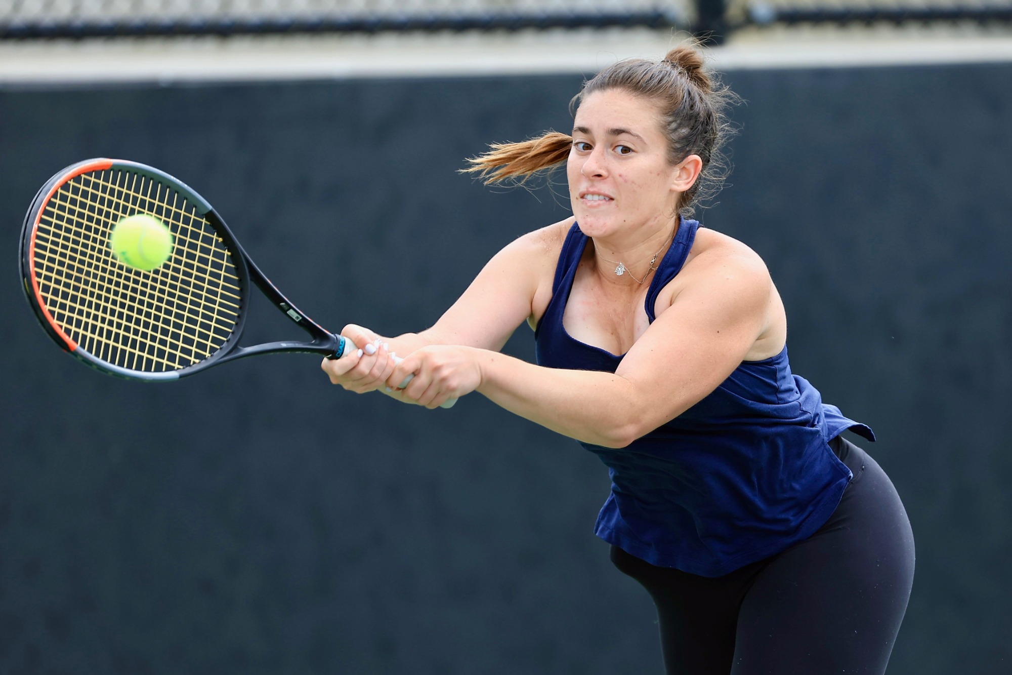 Rebecca Suarez lunges for a return  at the NCAA Championships