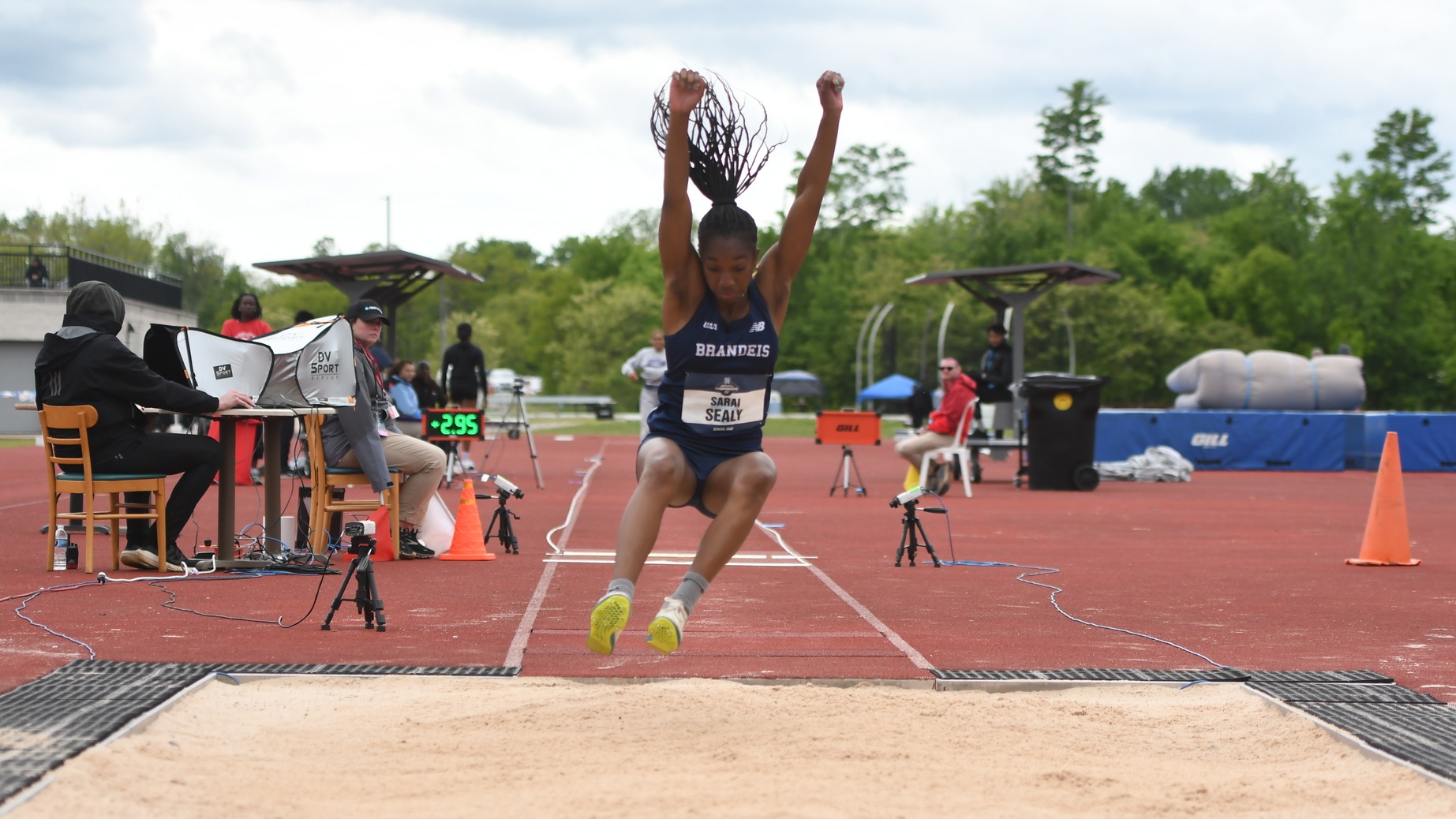 Sarai Sealy lands a triple jump at the NCAA Division III Outdoor Track and Field Championships