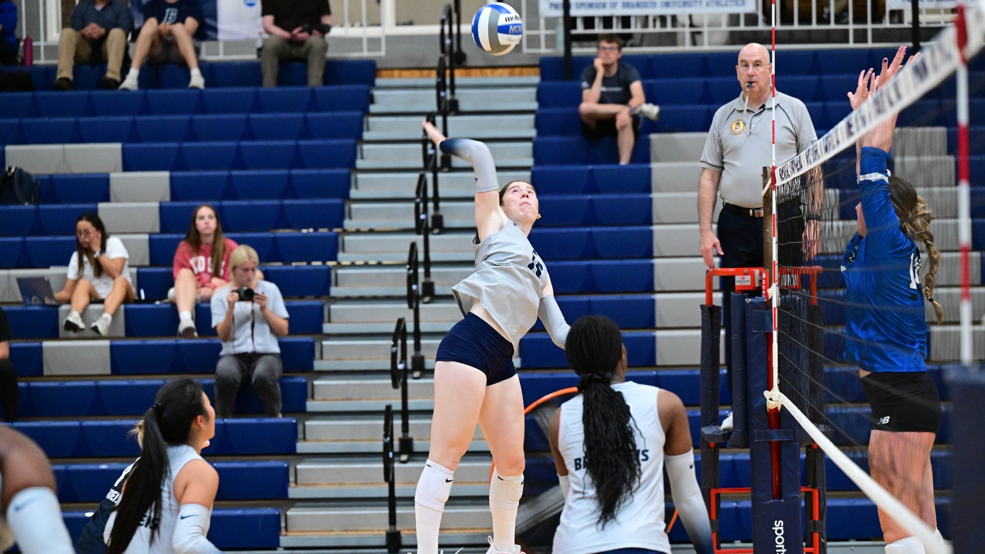 Anna Ertischek going for the kill against UMass Boston