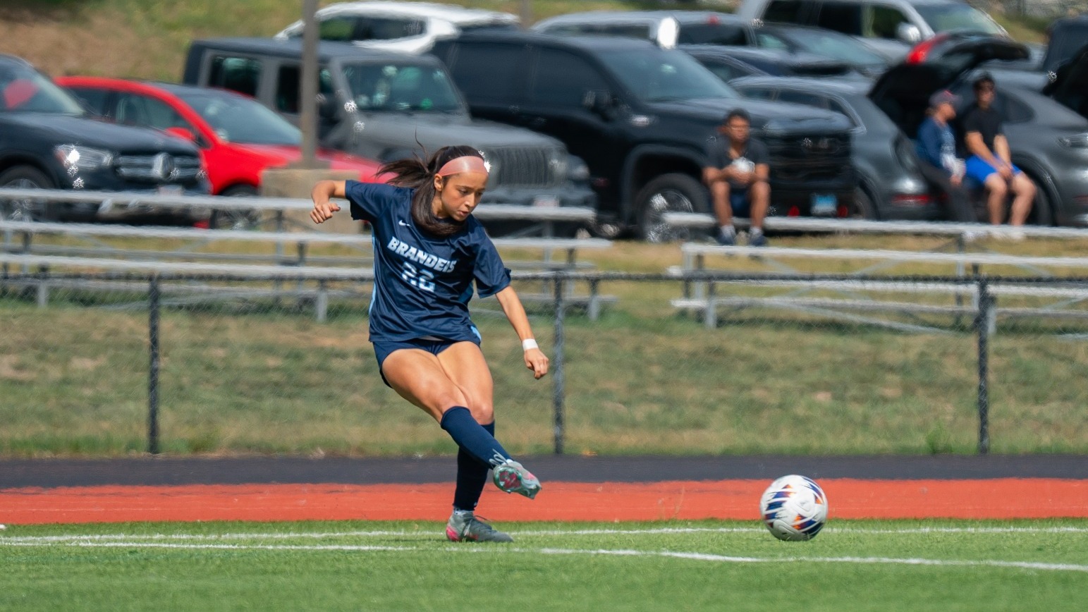 Charlie Sticka sends a cross into the box during a soccer match