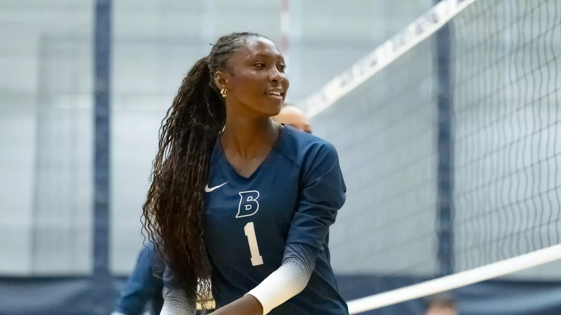 Kennedy Hilson at the net during a volleyball match