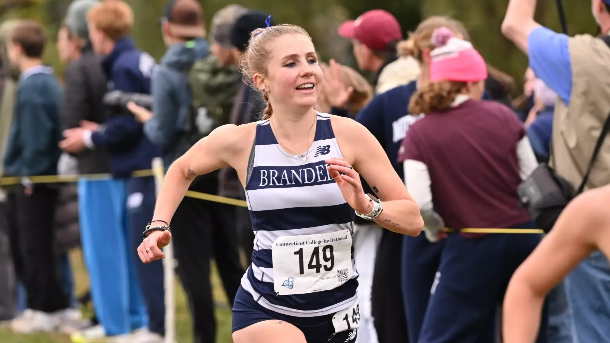 Mikaela Beeler running during a cross country race