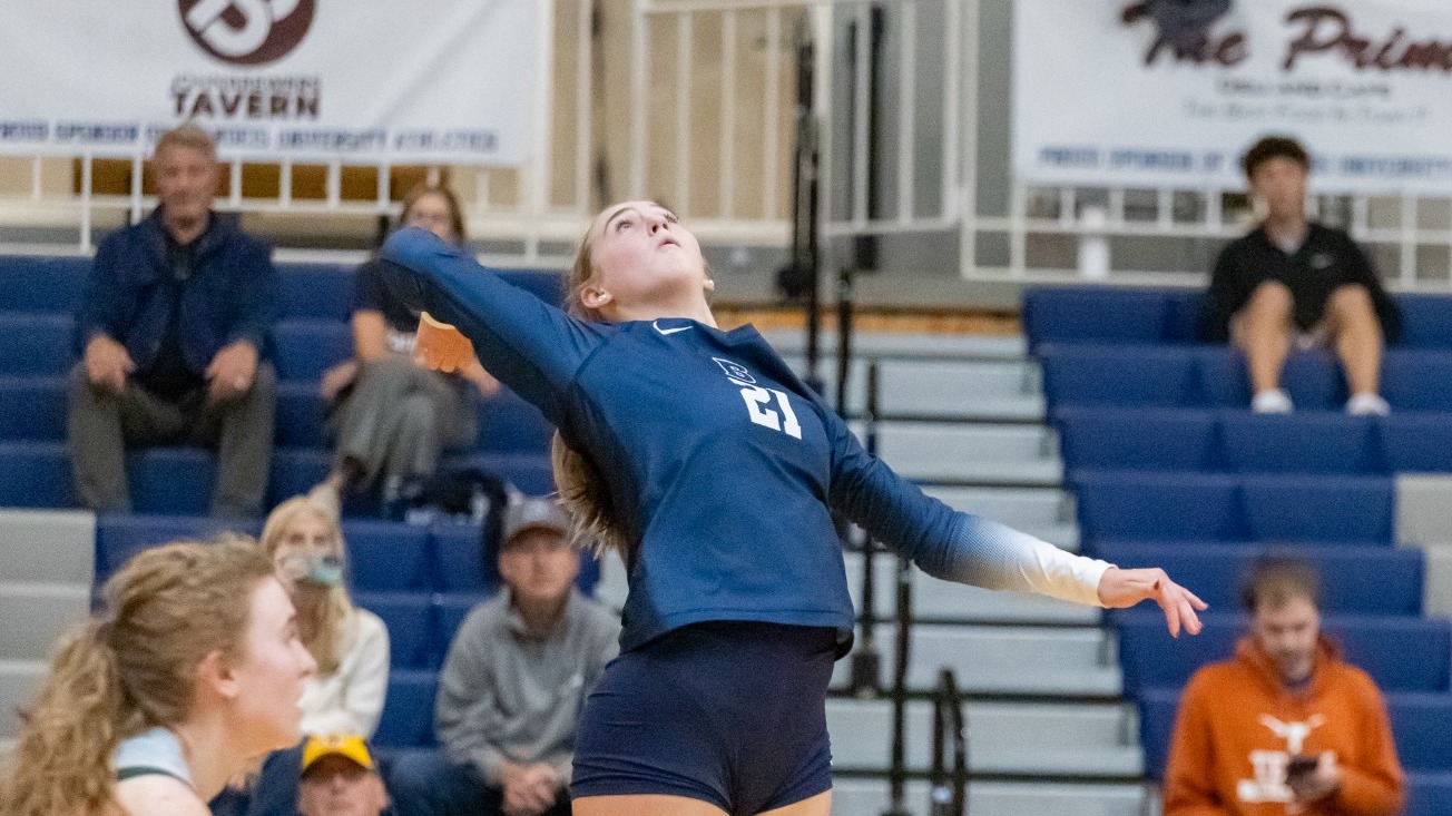 Emmory Casto gets ready to attack a volleyball