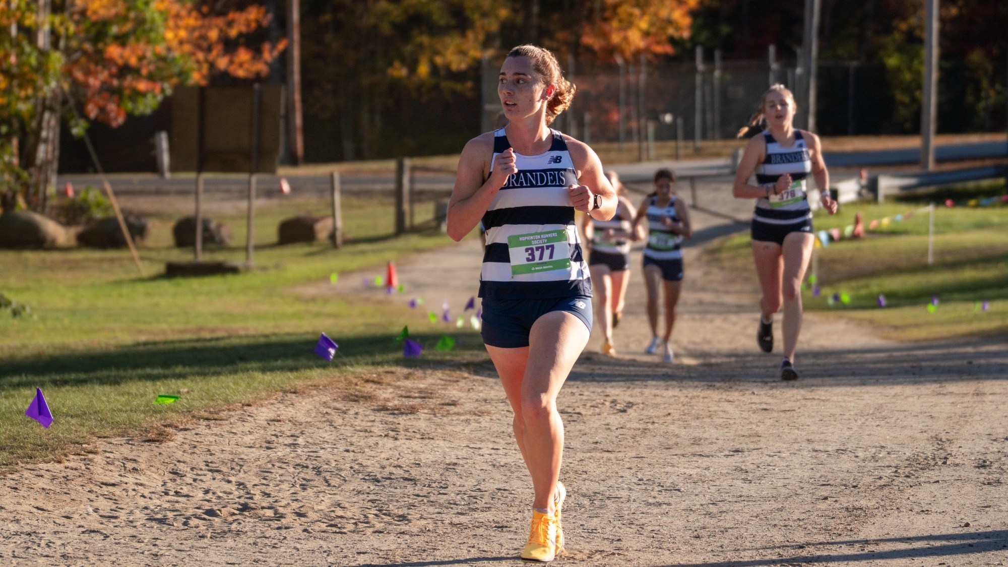Sadie Harrow running a cross country race