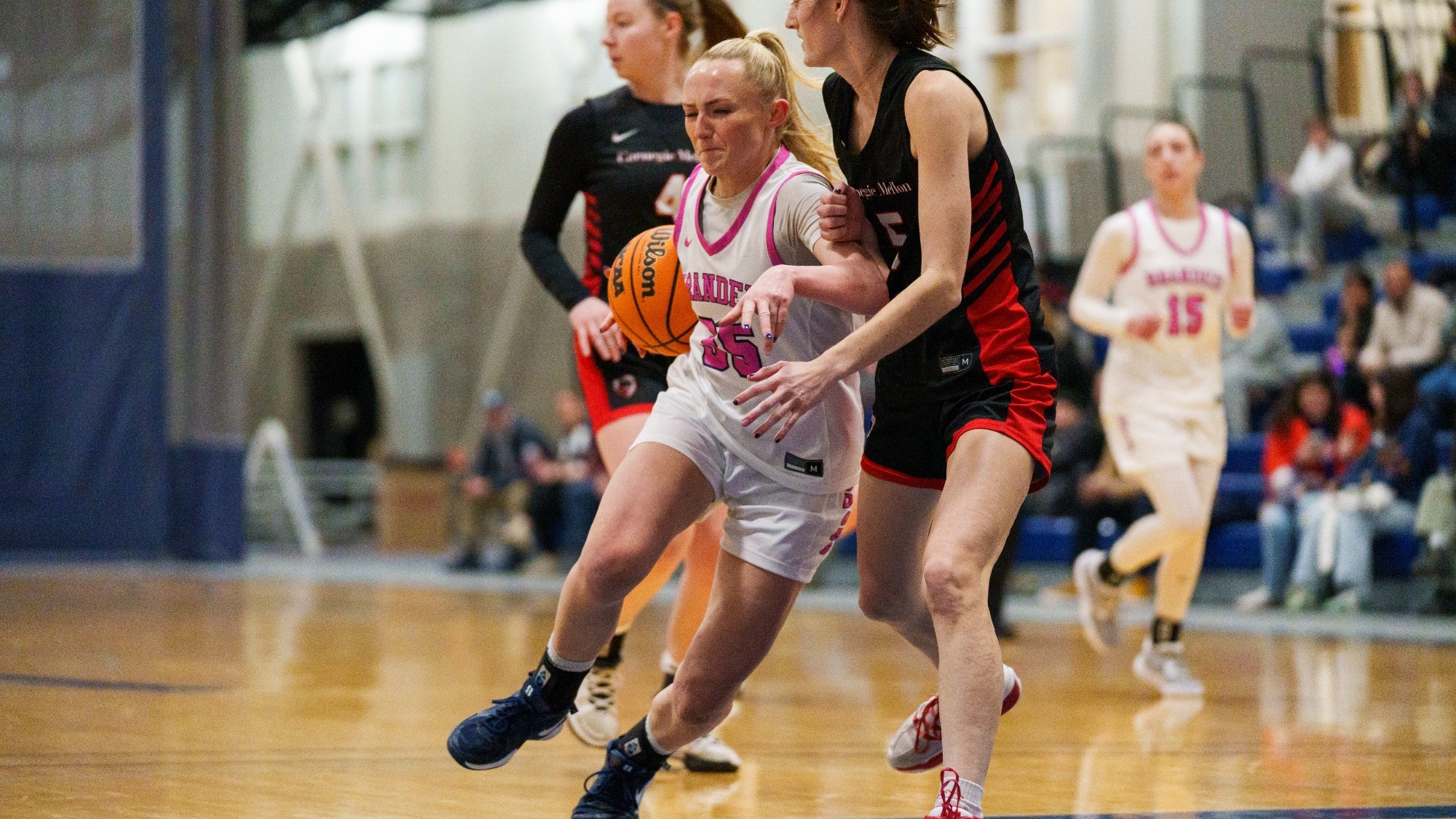 Abby Kennedy drives into a defender during the Carnegie Mellon game