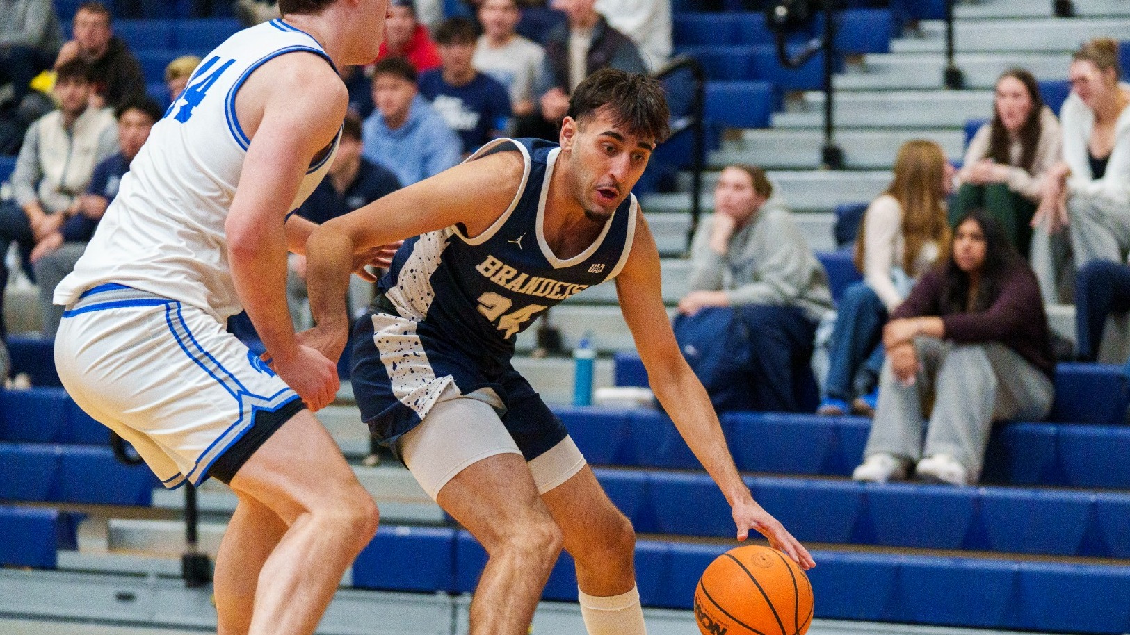 Gur Dhillon backs down his opponent during a basketball game