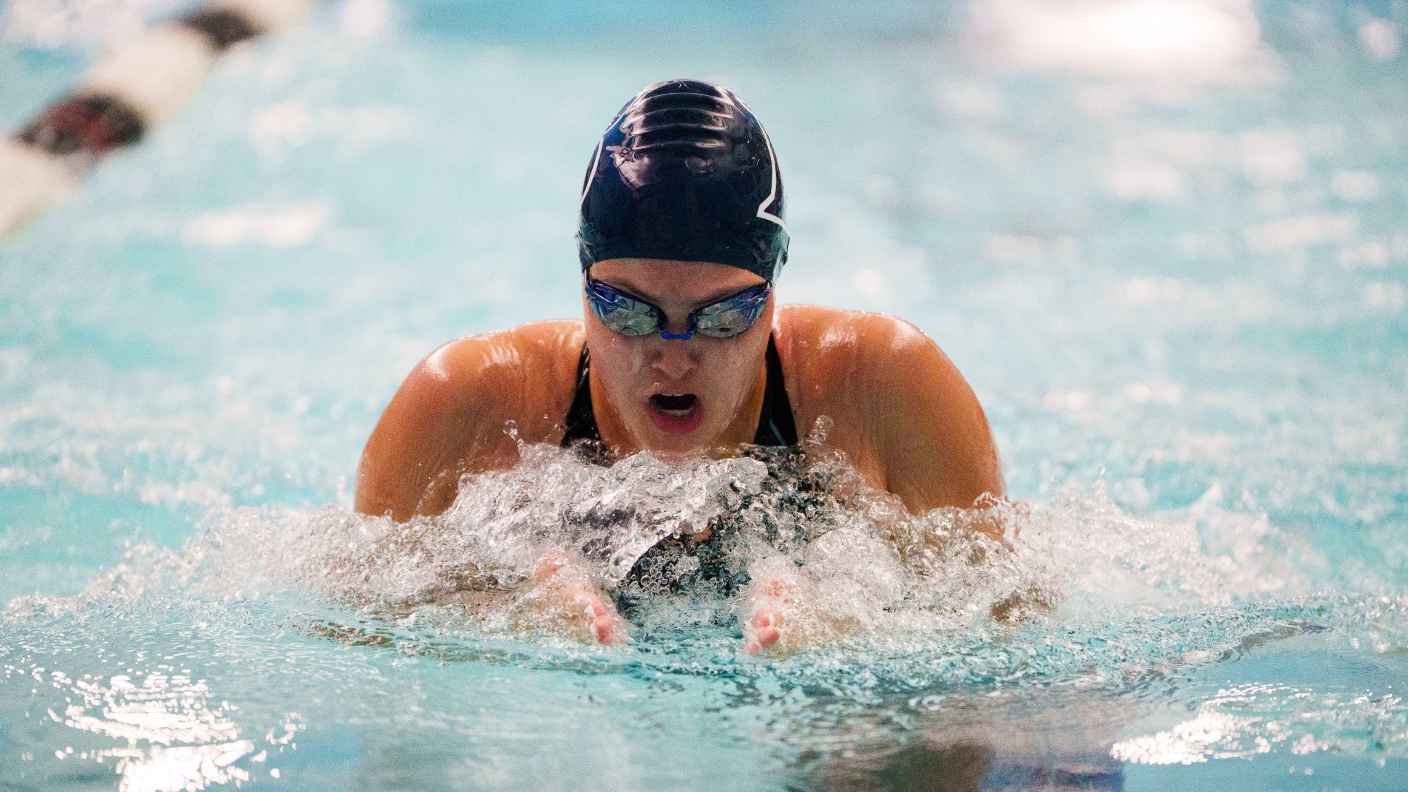 Michelle Weissler swimming the breaststroke