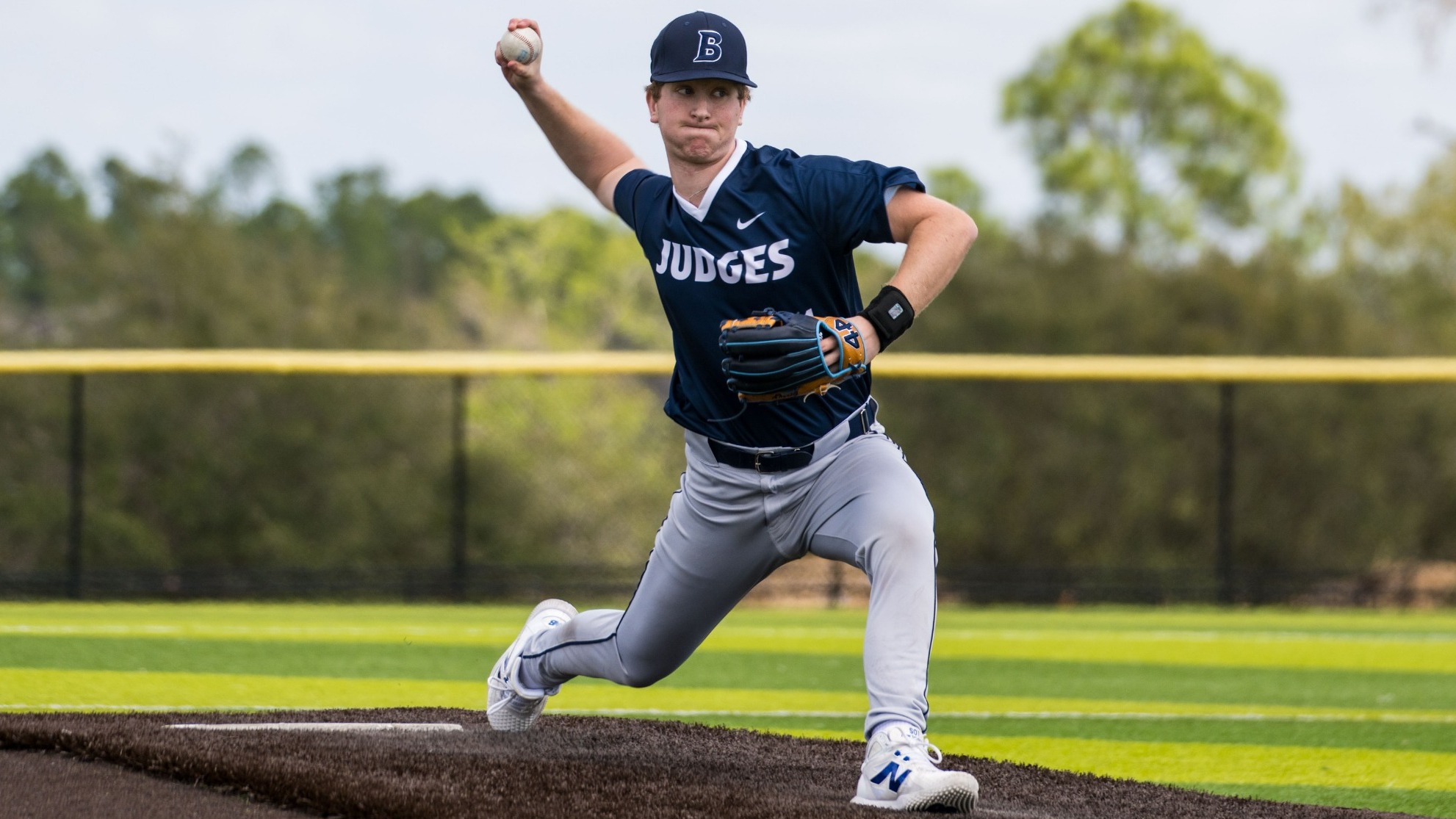 Brady Lane throws a pitch during a game against CCNY
