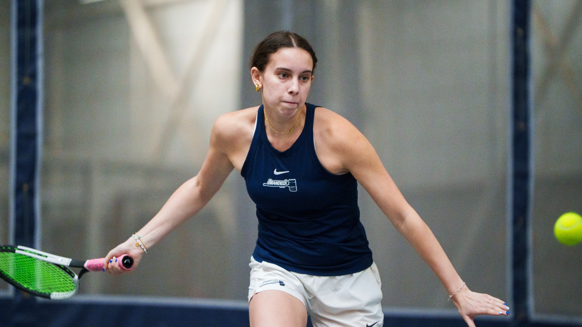 Charly Saltz gets ready to hit a return during a tennis match