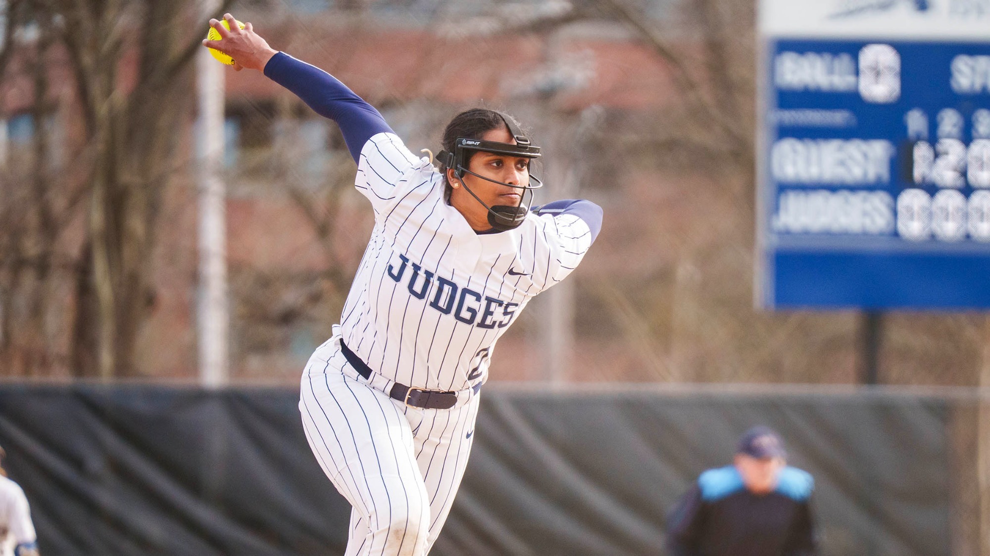 Ragini Kannan winding up to throw a pitch during a softball game