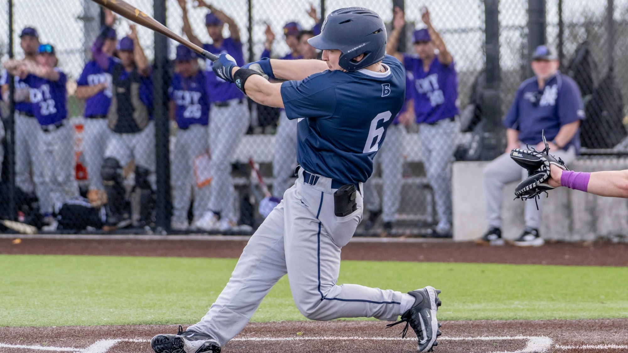 Ben Kuja swings at a pitch during a baseball game