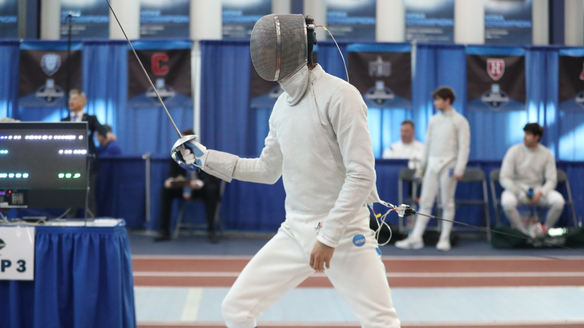 Lev BenAvram gets ready for a fencing bout at the 2025 NCAA Championships
