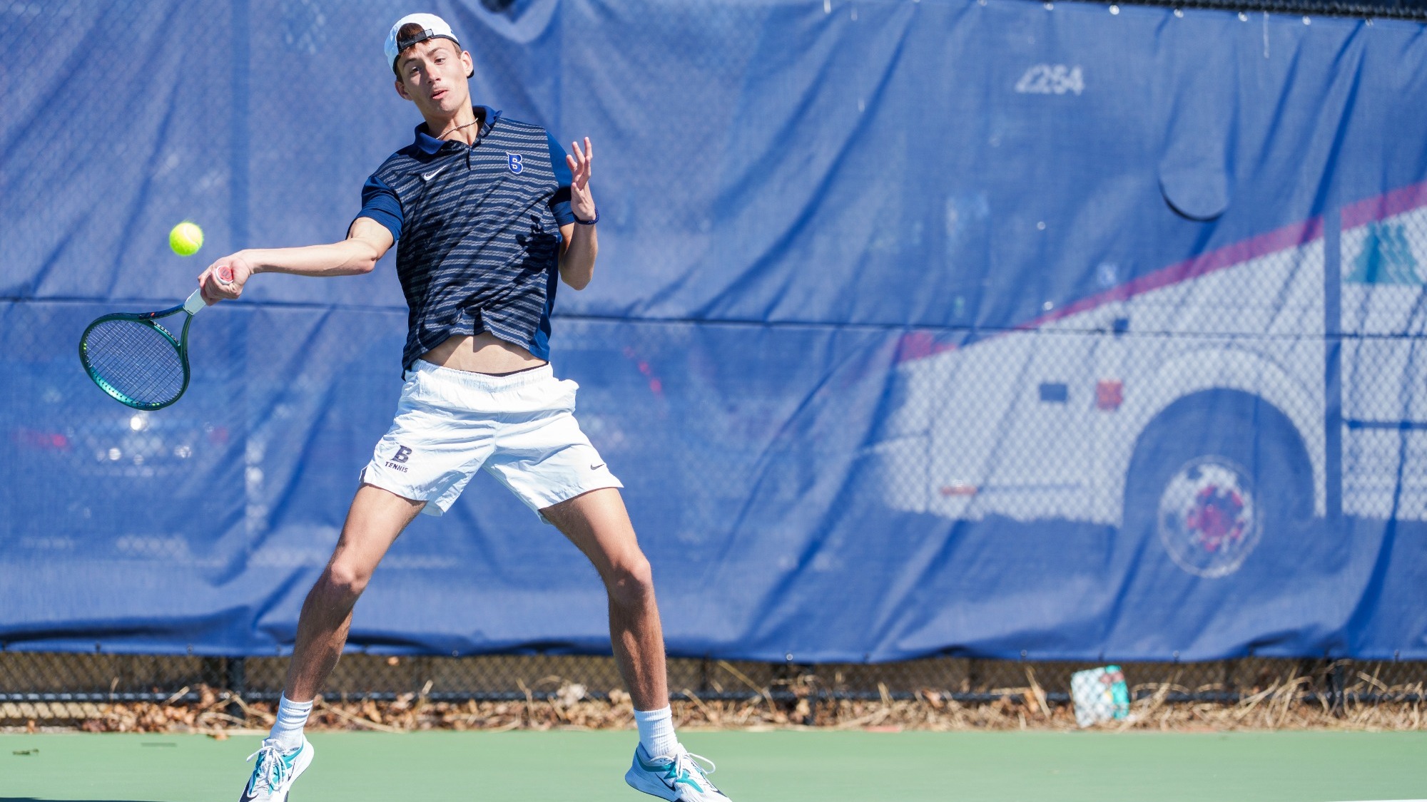Oliver Lorenz hits a forehand shot during a tennis match