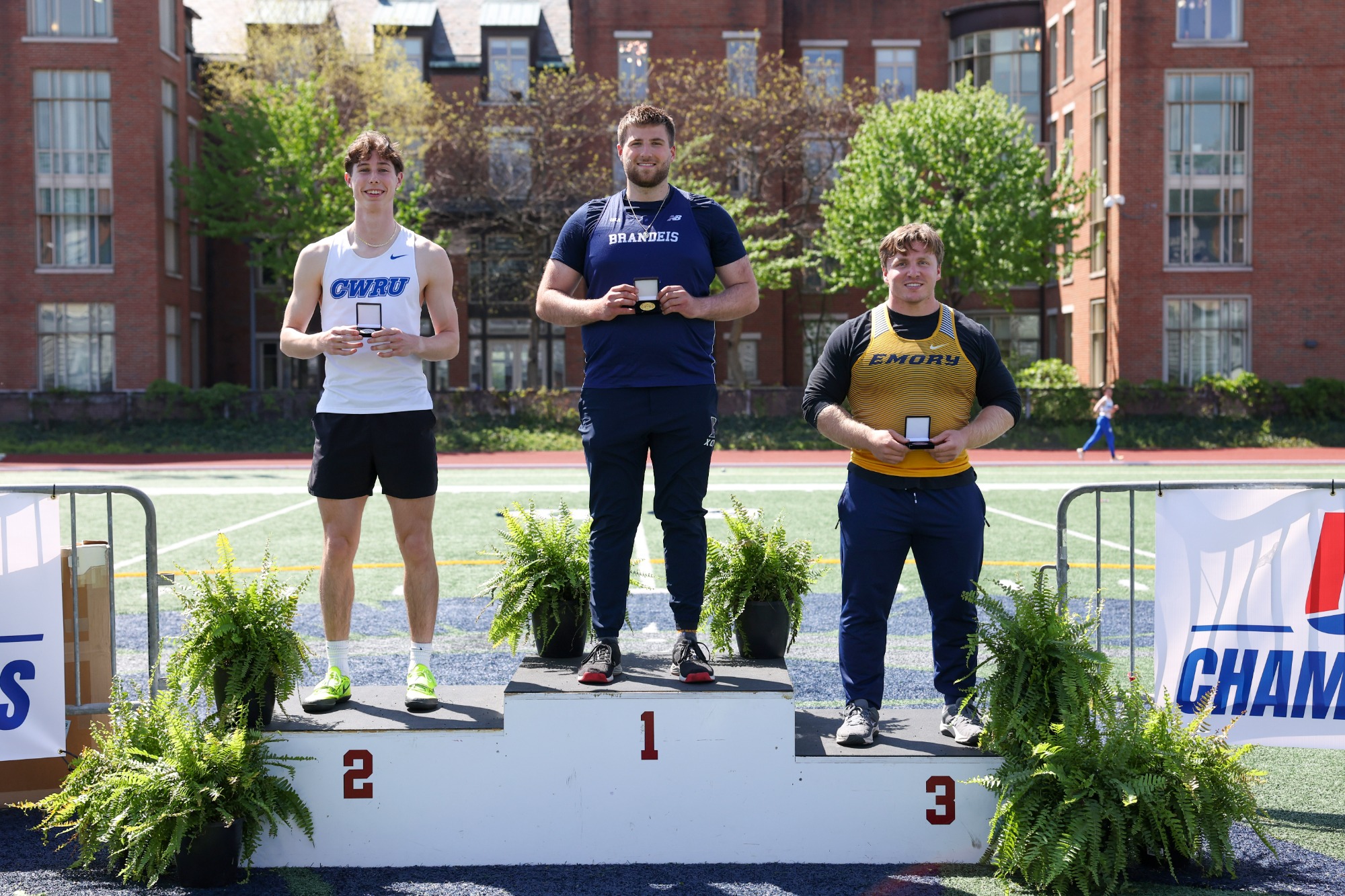 Top 3 finishers in the UAA in the men's discus throw, led by Brandeis's Michael Laurin in 1st place
