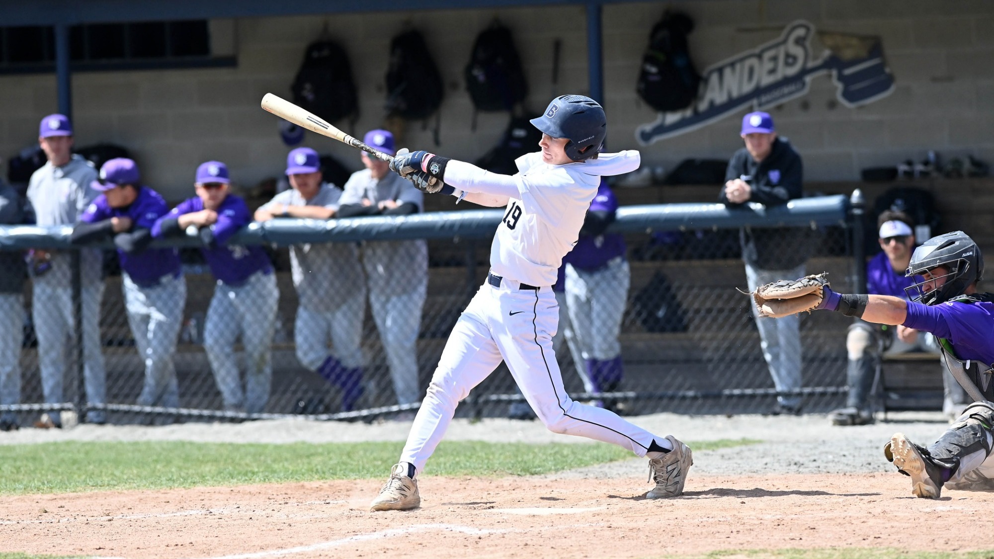 Connor Crowley captured mid-swing during a baseball game