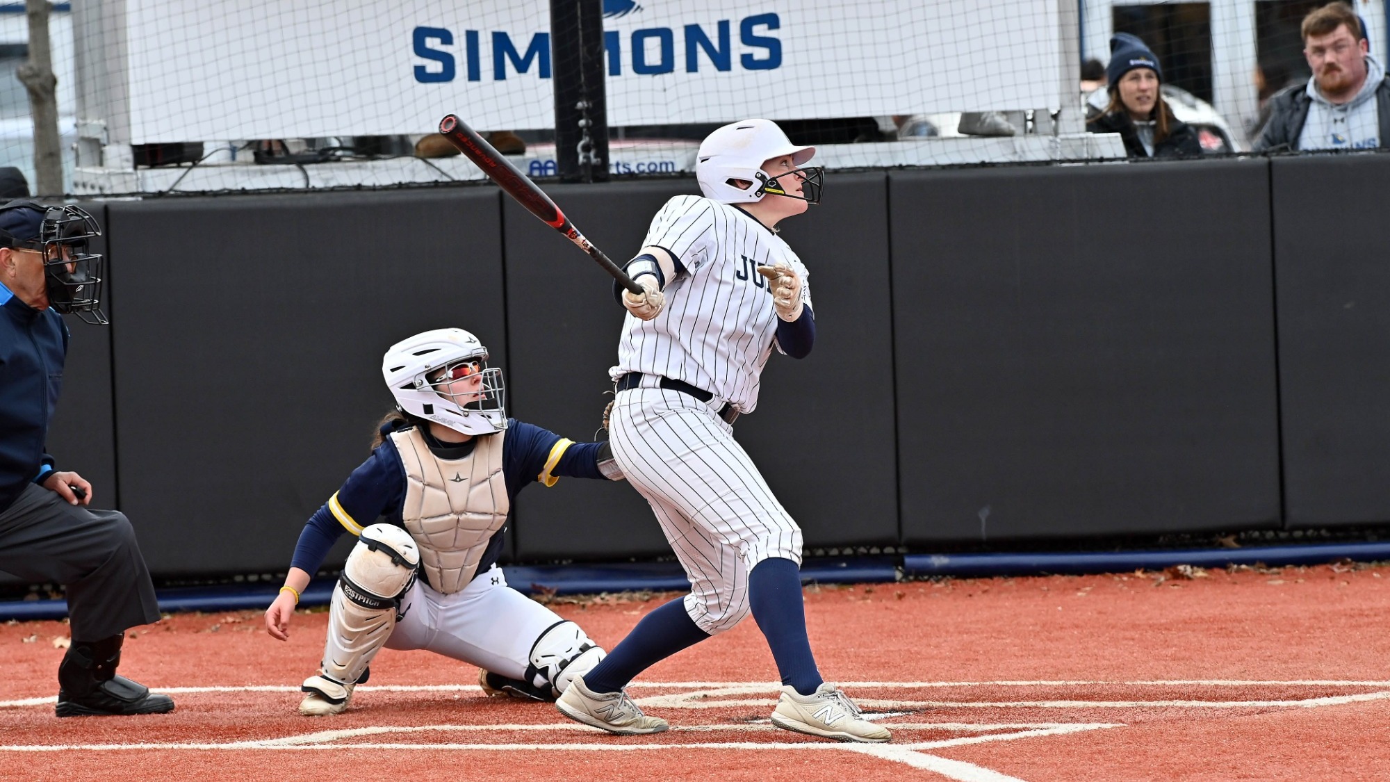 Brooke Boehmer following through on a softball swing